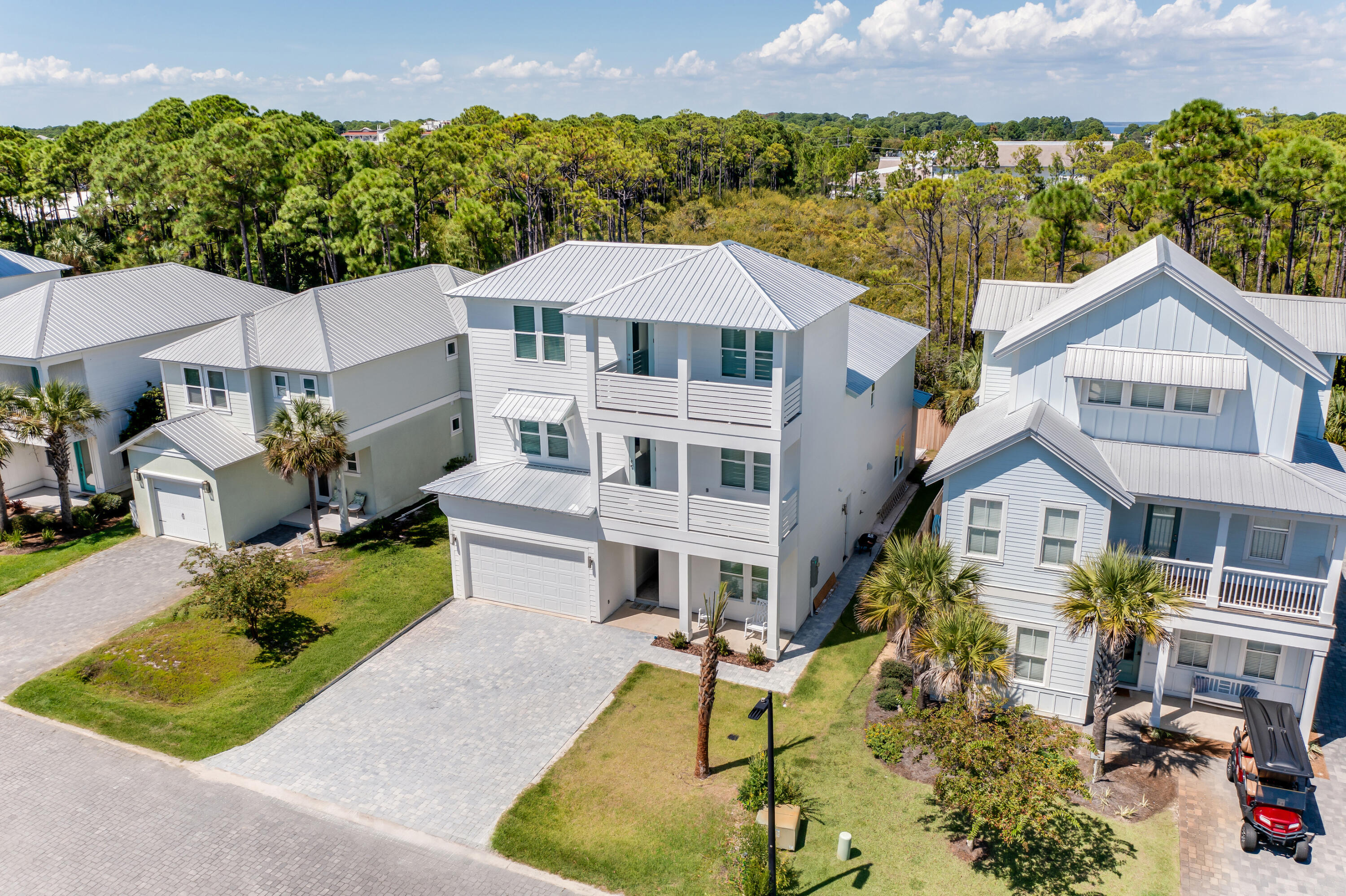 MOTIVATED SELLER -- Bring All Reasonable Offers! Introducing ''The Bentley'' floor plan, a newly constructed luxury beach estate designed to deliver the ultimate combination of upscale coastal living and exceptional investment performance. With projected rental income exceeding $200,000 annually and accommodations for up to 30 guests, this extraordinary property is built to impress both owners and vacationers alike.

Located inside the exclusive gated community of Frangista Beach in Miramar Beach, Florida, this stunning three-story residence offers over 5,000 square feet of thoughtfully designed living space featuring 6 bedrooms, 5 full bathrooms, and 2 half bathrooms. Delivered fully furnished, completely rental ready, and including a golf cart, this turnkey property is ready to immediately become a premier luxury vacation destination.

As a newly constructed home built to current building standards, buyers may also benefit from lower insurance costs and improved energy efficiency compared to older coastal properties.

''The Bentley'' floor plan was thoughtfully designed for entertaining, relaxation, and unforgettable large-group experiences. Expansive open-concept living areas, soaring wood-plank ceilings, designer lighting, and oversized sliding glass doors create a seamless indoor-outdoor flow that captures the essence of luxury beach living. The chef-inspired kitchen showcases quartz countertops, upgraded GE Café Series appliances, a built-in wine refrigerator, and premium finishes, while the spacious game room with casino-style games creates the perfect entertainment space for guests of all ages.

Step outside and experience your own private resort atmosphere featuring covered outdoor living spaces and a backyard putting green perfect for entertaining after a day at the beach. Just a short walk away, private deeded beach access and beach service with umbrella and chair rentals elevate the experience even further.

Residents and guests enjoy 24-hour gated security, access to the community clubhouse pool, and one of the most desirable locations along Scenic Gulf Drive -- ideal for biking, strolling, or cruising by golf cart to nearby dining, shopping, and entertainment.

Whether you're seeking a high-performing vacation rental, a luxury coastal getaway, or both, this exceptional Frangista Beach estate delivers unmatched style, comfort, and income-producing potential in the heart of Miramar Beach.