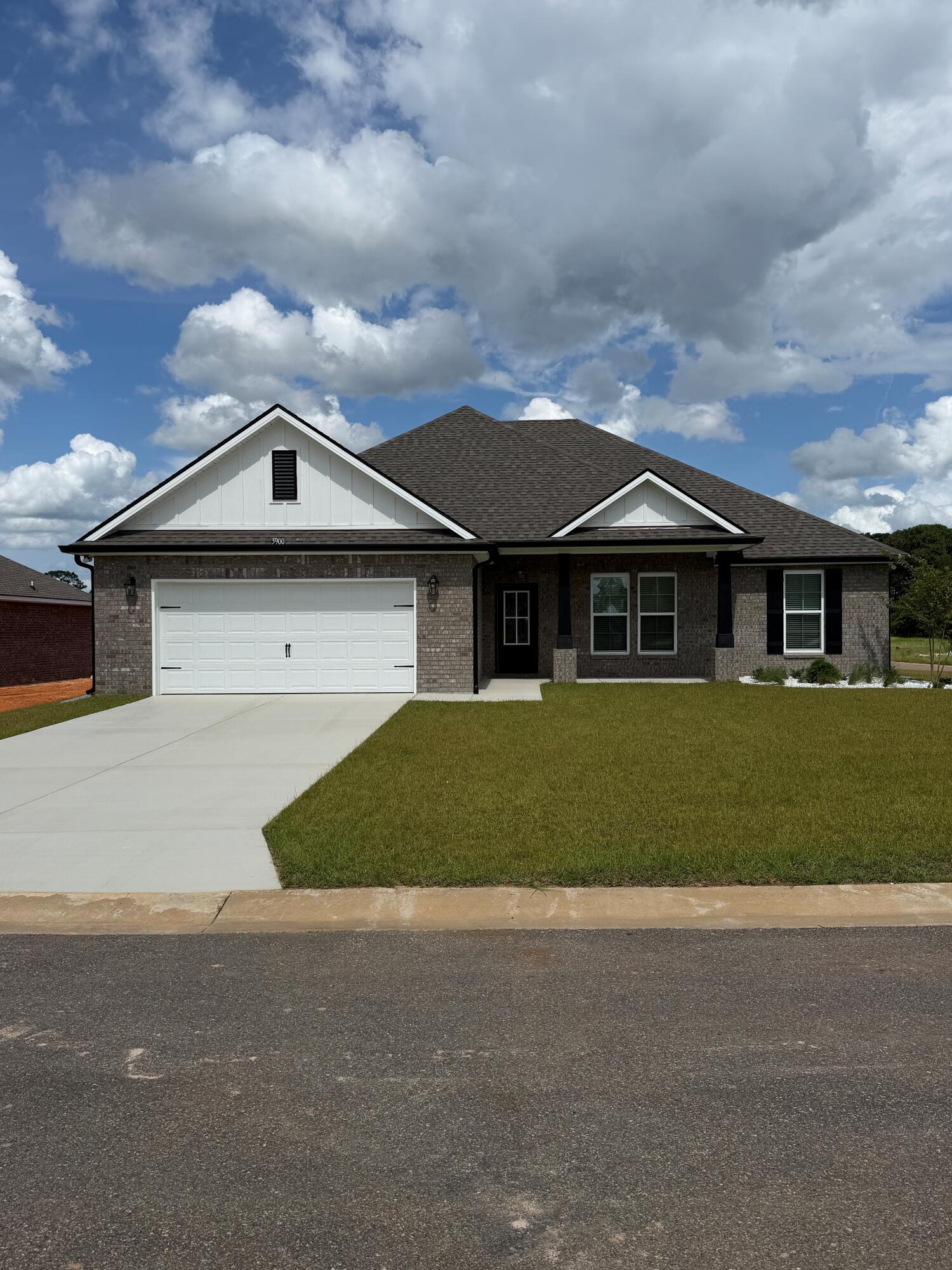 Located on a corner lot, the IONIA III H in Houston Place community offers a 4BR/2BA, open design. Upgrades added (list attached). Features: double vanity, garden tub, separate shower, and walk-in closet in master bath, double vanity in 2nd bath, kitchen island, walk-in pantry, boot bench and drop zone in mudroom, covered porches, undermount sinks, maple cabinets with hardware, LED lighting, crown molding, framed mirrors in all baths, landscaping, architectural 30-year shingles, flood lights, and more! Energy Efficient Features: water heater, electric kitchen appliance package, vinyl low E MI windows, and more! Energy Star Partner.