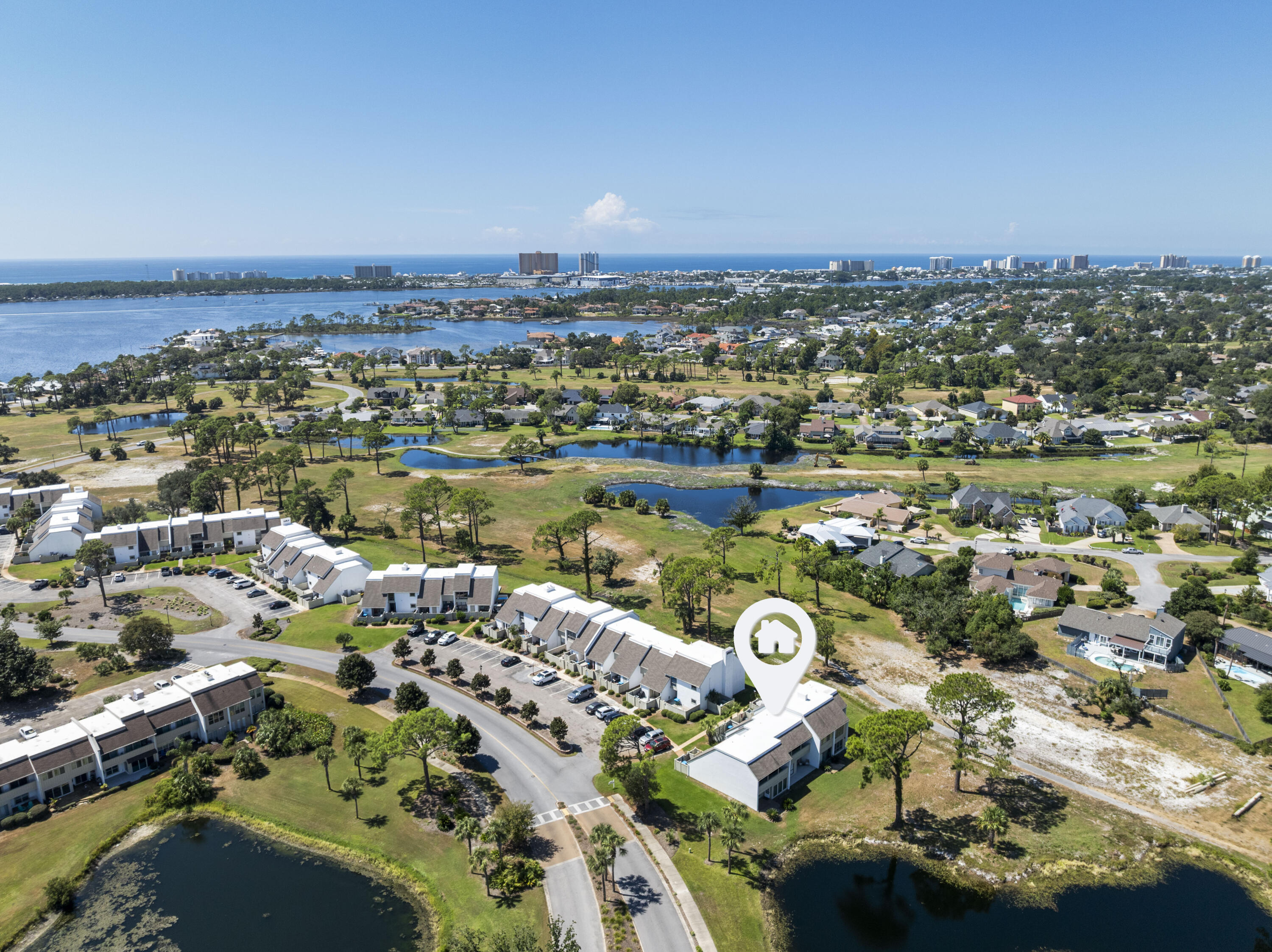 Freshly renovated and move-in ready, this three-bedroom, three-bath two-story golf villa is located in the highly sought-after Bay Point community. Rarely available, these specific villas allow for short-term rentals, making this an excellent opportunity for both homeowners and investors. Every detail has been thoughtfully updated to provide modern comfort while maintaining a timeless appeal. This one stands out and is turn key! The interior has been freshly painted throughout in Sherwin Williams Alabaster and Repose Gray, creating a clean and inviting backdrop. Popcorn ceilings have been removed and replaced with a smooth Level 5 finish, giving the home a more contemporary look and feel. Updated light fixtures, door knobs, and hinges further enhance the interior, while cordless blinds on the first floor and room-darkening drapes in the upstairs bedrooms add both style and function. The main level features a bright open layout with flexible living space. A newly added set of barn doors allows the downstairs living area to be used as a private office, den, or third bedroom, making the home adaptable to a variety of needs. A full bathroom on this level provides additional convenience for guests or multi-generational living. The kitchen is equipped with brand new WiFi-enabled appliances, including a whisper-quiet 46-decibel dishwasher. Just off the kitchen is a laundry area with a 2024 washer and dryer set included. Upstairs, two bedrooms and two full bathrooms provide private retreats for family and guests. The hallway features a spacious walk-in closet, offering ample storage rarely found in similar villas. Both bathrooms have been freshly updated to reflect the home's modern finishes. In 2023, a new HVAC system was installed along with sliding glass doors on the second floor, adding efficiency, comfort, and peace of mind for the new owner. This villa is as practical as it is stylish. Beyond the interior upgrades, it offers desirable functionality for everyday living and for use as a vacation rental property. Its thoughtful design balances open gathering areas with private bedroom spaces, making it ideal for both entertaining and relaxation. Bay Point is known as one of the premier gated communities in the area, offering resort-style amenities, golf, and a vibrant marina lifestyle. This villa is located within walking distance of the marina, giving owners easy access to boating, fishing, and dining. The combination of location, condition, and rental flexibility makes this property a rare find in today's market. The Bay Point Golf Villas HOA provides residents with a low-maintenance lifestyle by including valet trash service, water, and sewer in the monthly dues. Exterior insurance coverage, building maintenance, and professional landscaping and groundskeeping are also included, ensuring the community remains beautifully maintained and hassle-free for owners. Whether you are looking for a full-time residence, a second home, or a short-term rental investment, this renovated golf villa at Bay Point is ready to welcome its next owner. Schedule your private showing today and experience the lifestyle this property has to offer.