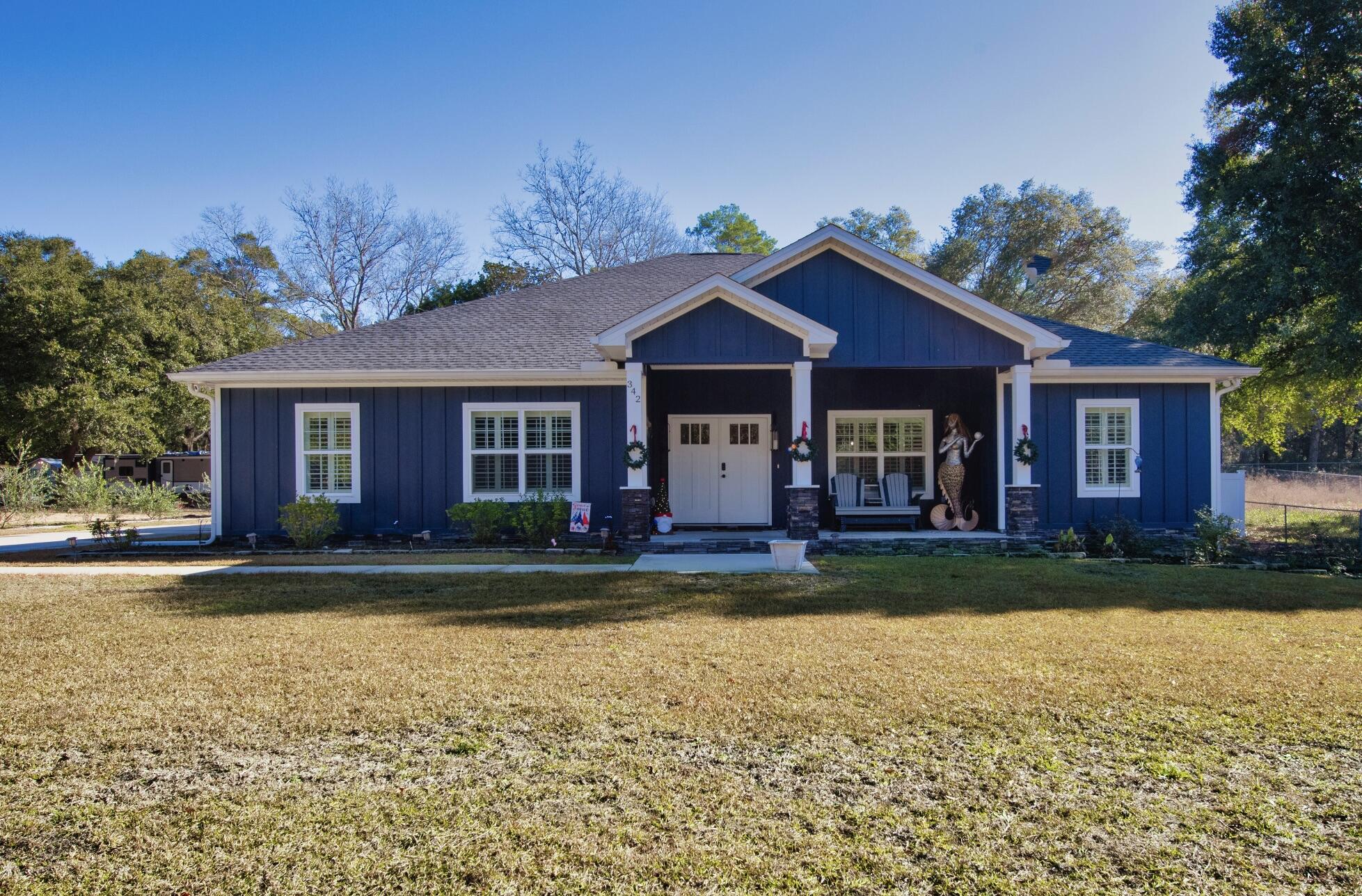 Beautiful home, a must see with no HOA! A place to park an RV or boat!  Walk into a relaxing and  well appointed living area, kitchen and dining area with a split floor plan which features master suite on the left, powder room, laundry room and bonus room upstairs with 1/2 bath. The master bath has a large walk-in tiled surround shower, dbl vanity with lighted mirror and a generous walk-in closet. Two guest bdrms & full ba is on the right.  Glass barn doors separate the FL room from the kitchen/dining area.  Conversations are easily made w friends & family while sitting at the bar counter, bistro table or just relaxing on the couch and watching tv w an electric fireplace for a distinctive atmosphere.   French doors open to an amazing 14 x 28 pool w heated spa with brick paved decking. LVT flooring throughout the homefor durability and easy upkeep. Custom cabinets & leather granite in the kitchen with wine cooler and stainless steel appliances. The back yard is fenced-in and has a 12 x 24 outbuilding for outdoor tools and equipment. Sit in your 2nd floor bonus room which overlooks your backyard and absorb the beauty of the trees and wild life on Eglin Reservation. There is a public boat launch in Choctaw Beach on Hwy 20 less than a mile away. Travel west to Destin over Midway bridge and be there approx. 20 minutes or go East to Freeport.
Buyer(s) are responsible to personally verify all details for property and dimensions. Any information contained in this listing is believed to be accurate but is not guaranteed.