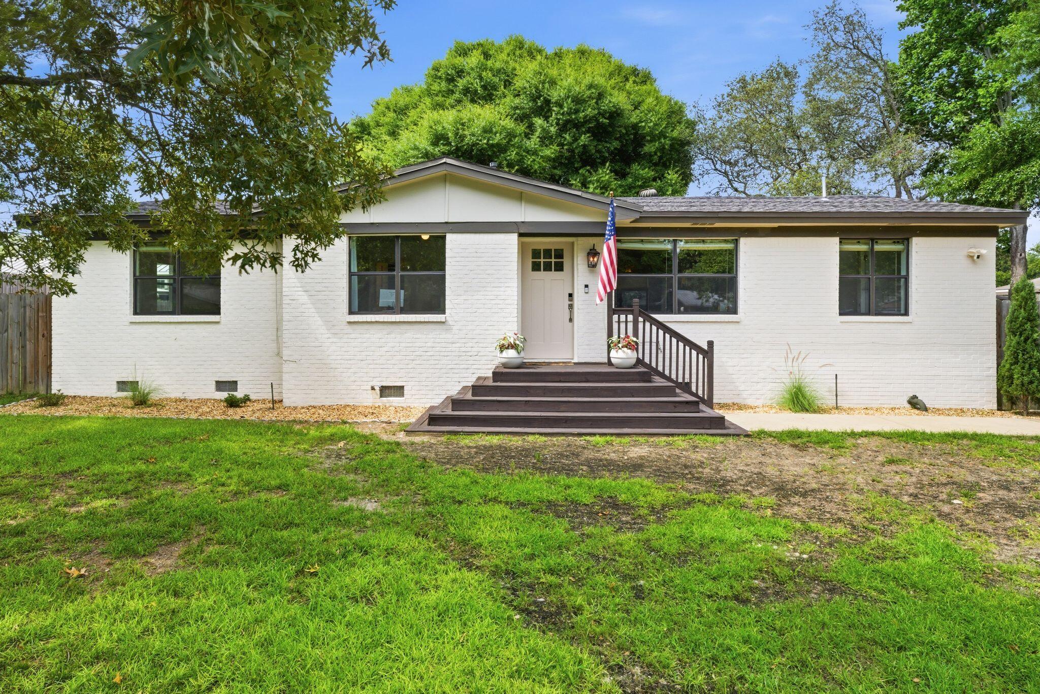 Located just one block from Destin Elementary and walkable to Joe's Bayou boat ramp, you don't want to miss this 4 bedroom home centrally located with no HOA! Reimagined and thoughtfully updated, this single-level Destin home blends mid-century charm with modern upgrades. Inside, you'll find refinished hardwood floors, abundant natural light, and an updated kitchen featuring granite countertops, stainless appliances, and a timeless white palette.

The renovated primary suite offers a spa-like bathroom with a soaking tub, walk-in shower, custom finishes, and a large walk-in closet with built-ins, while three additional bedrooms provide flexibility for guests, family, or a home office. Major 2020 upgrades include the roof, HVAC, tankless water heater, windows, fencing, new driveway, and a primary suite and bathroom addition.

Outside, the oversized fenced backyard offers room for a pool, entertaining, boat/RV storage, or simply enjoying the privacy of the large lot. Don't miss this opportunity to own a move-in ready home in a prime location!