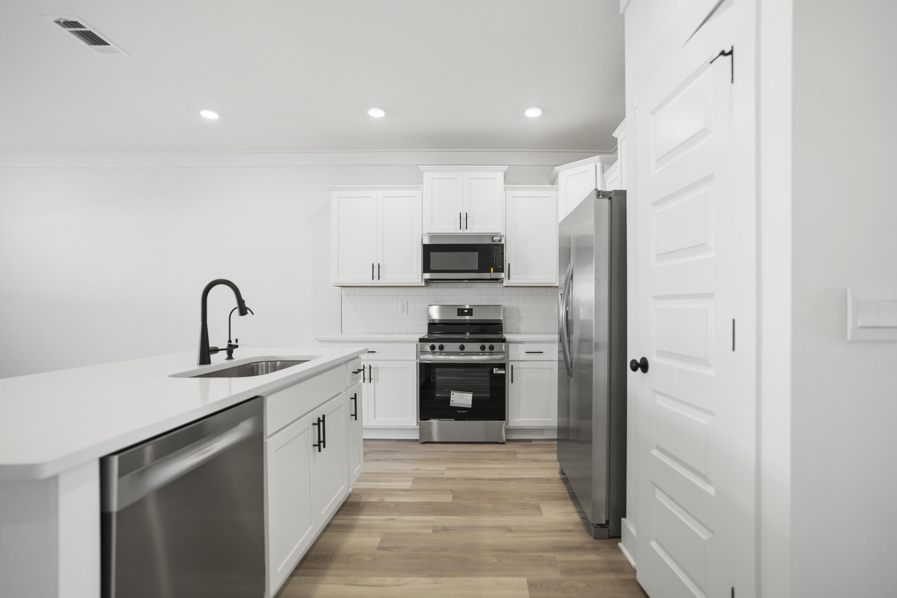Brand new 3 bed, 2.5 bath townhome with upgraded Tier-2 luxury package. This 1,459 sqft two-story interior unit offers comfortable, low-maintenance living. The bright entry opens to an open living and kitchen area with 9' ceilings, a center island, quartz countertops, and stainless steel appliances. Upstairs features a primary suite with walk-in closet, double vanity, and glass/tile shower, plus two additional bedrooms and a full bath. Enjoy a private back patio, single-car garage, and landscaped entry. Located just 1.5 miles from the beach and close to shopping, dining, and golf. Eglin AFB is under 15 miles away and VPS about 30 minutes. Pets considered case-by-case with deposit. Tenant pays utilities. Non-smoking. Credit/background check required. HOA maintenance included.