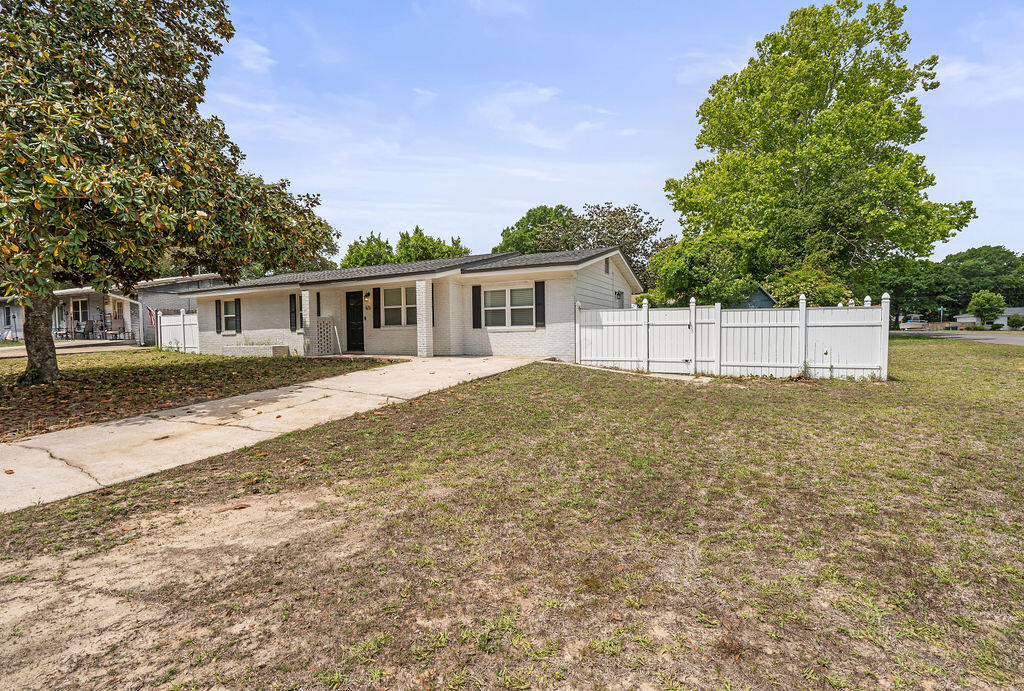 Move-in ready gem in Shalimar! This stunning 3BR/2BA home (1,407 sq ft) offers total peace of mind with a Roof (2023), HVAC (2021), and Water Heater (2021).

The interior is fully transformed with a renovated kitchen and modern bathrooms, featuring stylish flooring throughout and no carpet! The open layout is perfect for entertaining, while the backyard oasis features a custom stone paver walkway leading to an in-ground fire pit for cool Florida nights.

Located just minutes from Eglin AFB, local boat ramps, and shopping. Enjoy modern luxury and conveniences in a prime location. Schedule your showing today!