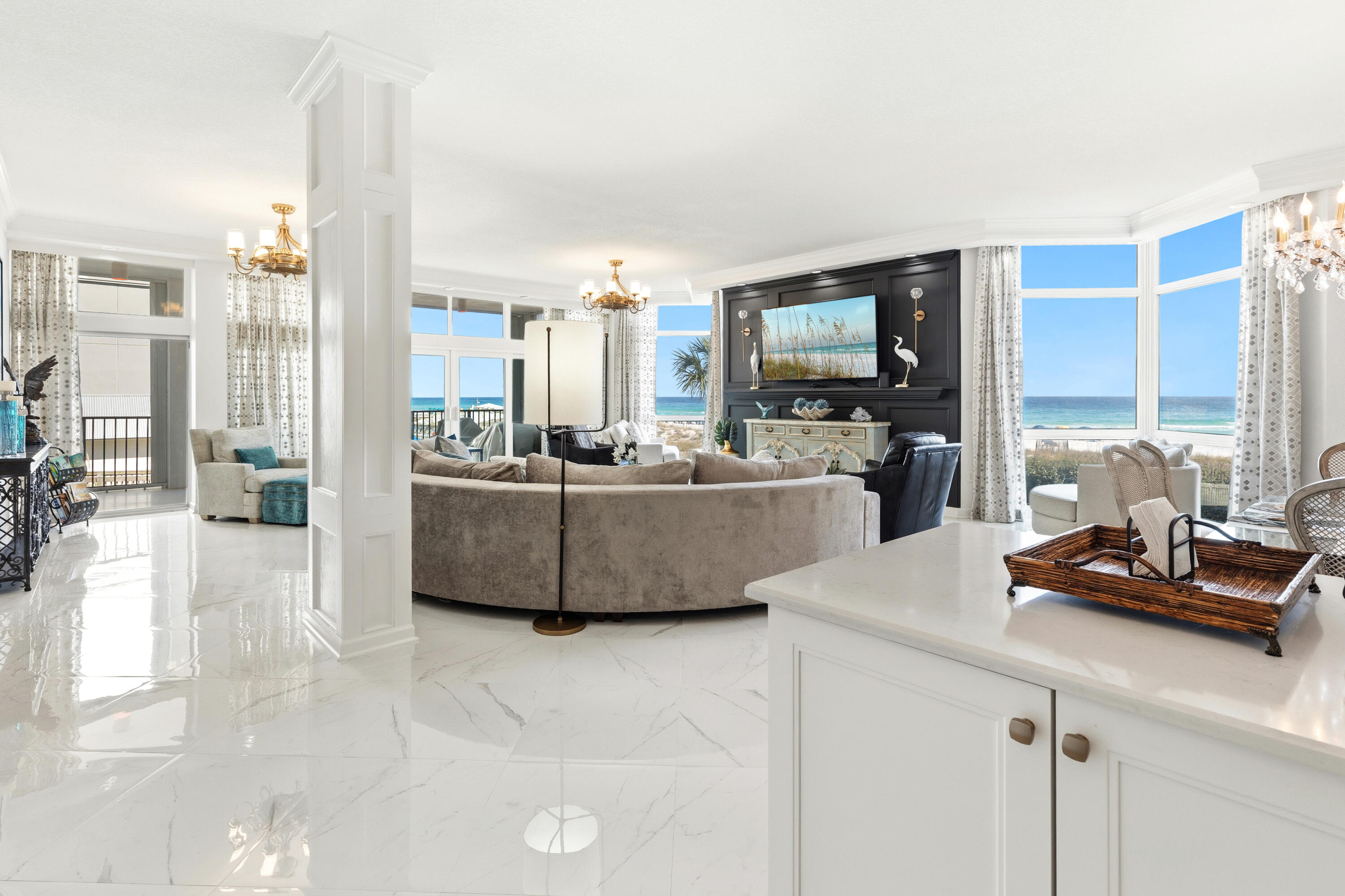 MUST SEE: PBEACH FRONT!! Experience Gulf-front living at Regency Towers Condominiums in Destin. This 3BR/4BA, 3,648 sq. ft. East Tower END UNIT residence is fully upgraded, elegantly furnished, and turnkey. Enjoy breathtaking Gulf views, a private deeded beach, assigned parking, 10x10 CC storage, an oversized deck, a pool, a full gym with saunas, a community room, & a recreation area. Only two condos per floor, full surveillance, on-site concierge, maintenance, and security offer resort-style living with privacy. The condo has complete water leak system in place and filtered water throughout. Daily trash pickup. All of the beautiful furnishings stay.  This condo is ready for its new owner. Bring your clothes.  Regency Towers delivers the ultimate beachfront lifestyle -- like living at the Four Seasons,