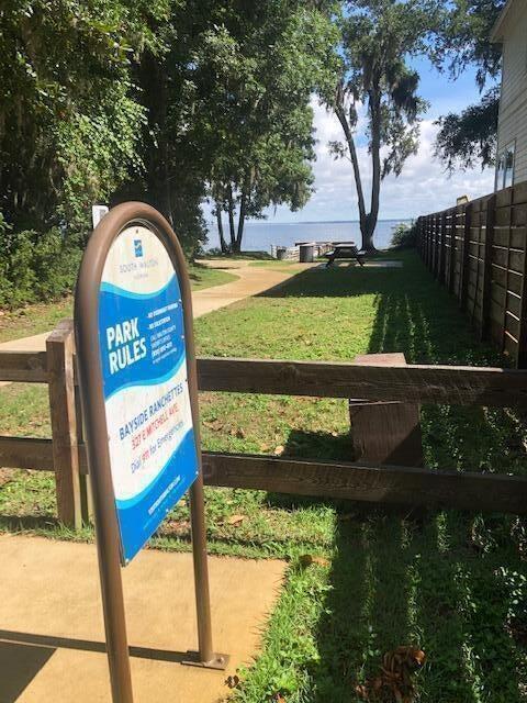 This Grayton Bayou homesite sits across from HOA land that will never be developed providing quiet living in Point Washington. The community boasts a pool and a park on the bay. No short term rentals. Plans and survey available. 50' X 150'.