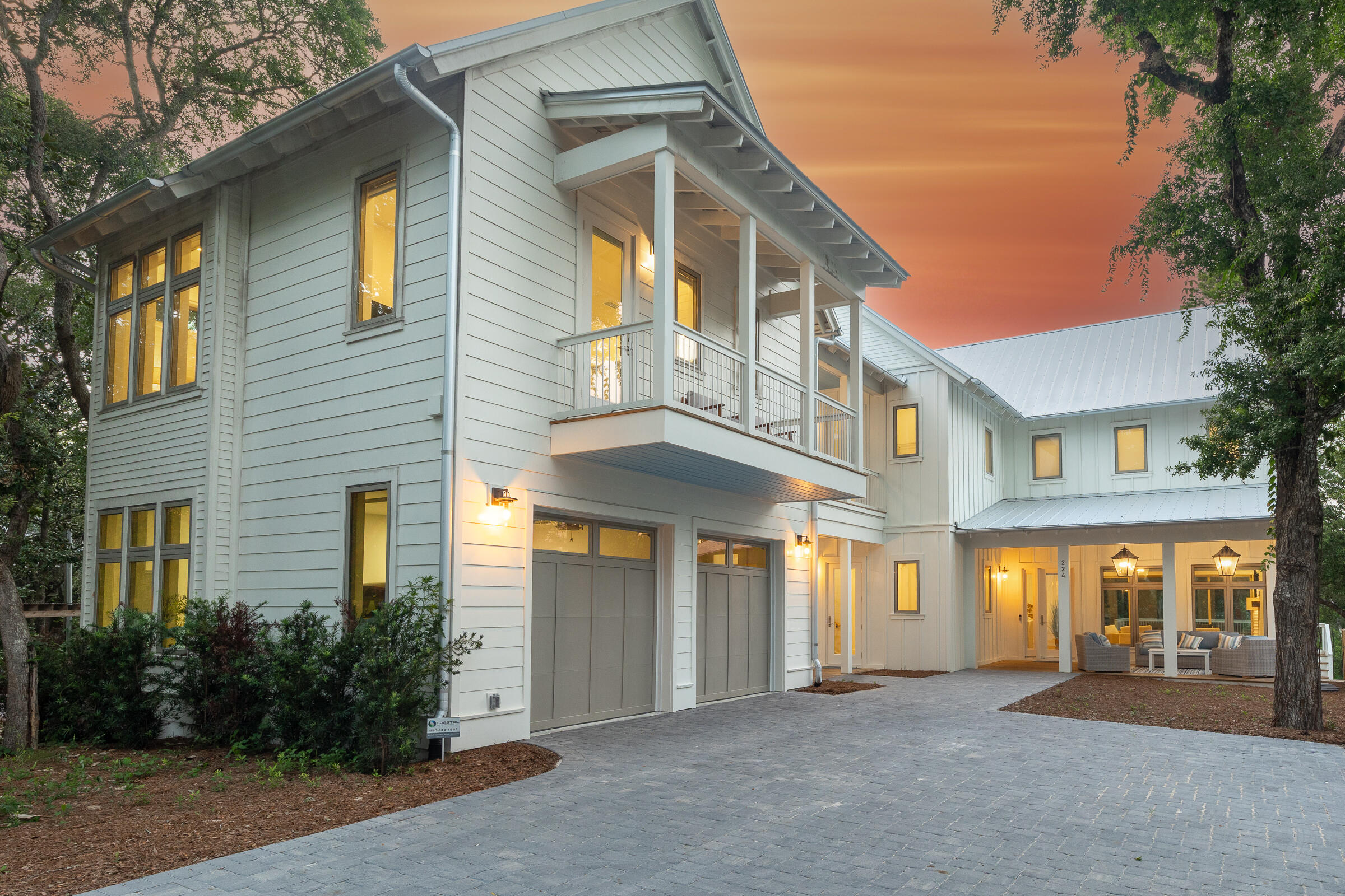 Welcome to 224 Canal Street, a stunning new construction residential private sanctuary offering 4,712 sq. ft.(6919 sq. ft.  under roof) of thoughtfully designed living space This 6-Bedroom 6 ½ Bath home with 2 car garage and Carriage house blends timeless coastal architecture with modern luxury. This exceptional home located in historic Old Seagrove Beach is perfectly positioned just minutes walking to beaches, shopping, dining, and the iconic charm of Seaside. Designed with everyday living and entertaining in mind, the spacious floor plan offers beautifully appointed  indoor and outdoor gathering spaces. Generous bedroom suites and a seamless flow between indoor and outdoor living. An elevator provides convenient access to all levels, making the home ideal for multigenerational living and guests alike. One of the property's most distinctive features is its large private wooded backyard filled with magnolia and Live Oak trees which create a peaceful natural setting rarely found this close to Seaside. Whether savoring the scenery from one of the large decks enjoying your morning coffee, hosting friends, or simply unwinding after a day at the beach, the tranquil backdrop offers exceptional privacy and a true connection to nature. The home's large lower-level deck features an outdoor kitchen, fireplace, pool and spa. The large upper screened deck also features one of the home's three fireplaces. Built with quality craftsmanship and attention to detail. This brand-new home delivers the perfect combination of luxury, functionality, and location. Whether you're seeking a full or part-time residence or investment opportunity, 224 Canal Street offers an exceptional lifestyle in the heart of 30A.