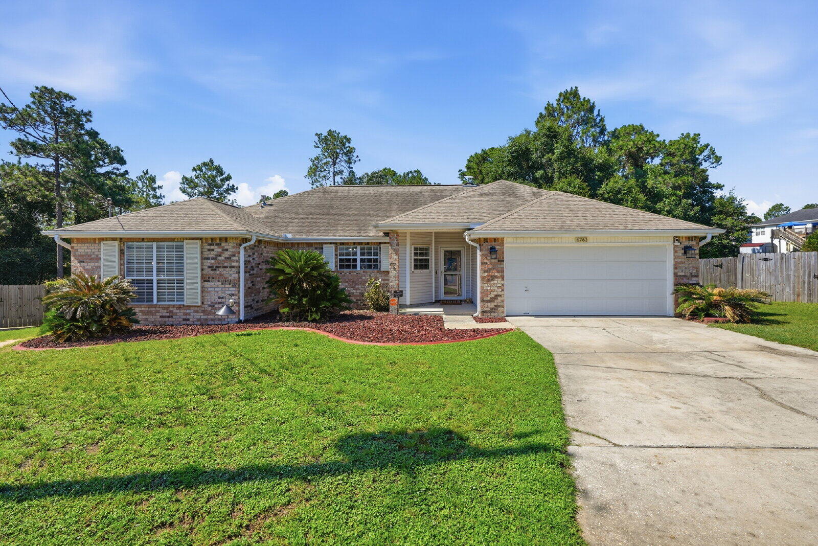 Indulge in the serene comfort of 4761 Connor Drive, a stunning 4-bedroom oasis in the heart of Crestview, FL. This spacious 1923 sq ft home offers a perfect blend of elegance and warmth, highlighted by chic granite countertops that adorn the modern kitchen, ideal for both casual meals and gourmet cooking adventures.  The inviting living area, centered around a cozy fireplace, promises countless evenings of relaxation and ambiance. With two full baths, mornings are a breeze, ensuring everyone can start their day refreshed and revitalized. The thoughtfully designed layout provides ample room for entertaining, making it the perfect backdrop for creating treasured memories.  Nestled in a peaceful neighborhood, this home offers a quiet retreat from the hustle and bustle, while still being conveniently located to local amenities. Whether you're enjoying a quiet evening indoors or hosting a lively gathering, this property effortlessly caters to all lifestyles. With an approved pet application, owner will allow fully grown dogs or cats up to 75 lbs or less with a $350 non-refundable pet fee for each pet and $10 per month for each pet. Residents are enrolled in the Coastal Realty Services Resident Benefits Package (RBP), which includes renters' insurance, HVAC air filter delivery, a resident rewards program, and more!