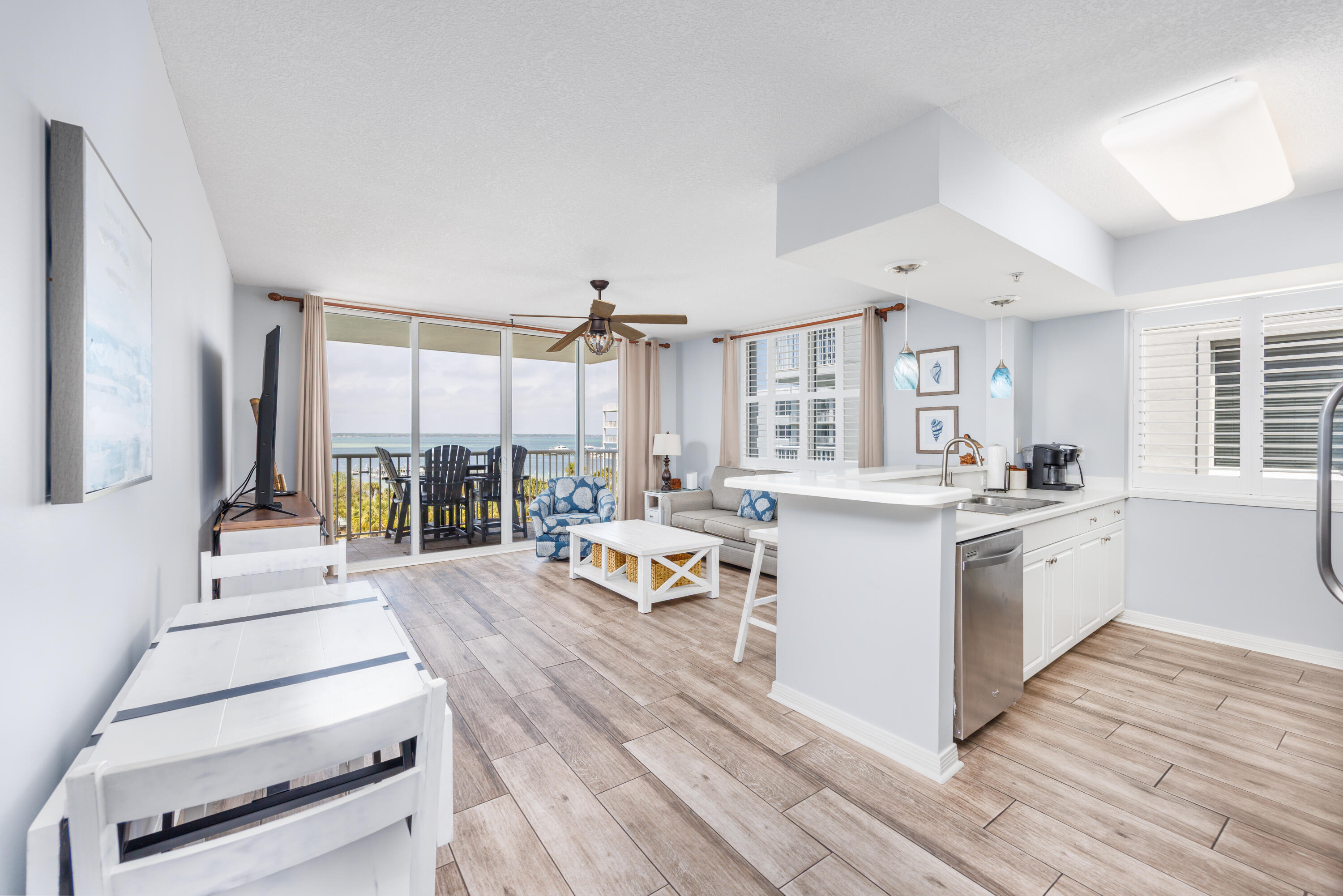 This beautifully updated 1BR/2BA bayside corner unit in Pelican at Destin West offers a rare feature not available with interior units: a private second balcony off the bedroom with elevated Gulf views! 
Inside you'll find all new paint, fresh furnishings, and stylish upgrades: new bedroom furniture with lamps, new couch & chair, coffee table, bar stools, entertainment center, ceiling fan, artwork, and bedroom TV. Relax on the main balcony with all new Polywood patio furniture and views of both the Bay and waterpark! 
Full resort amenities include the famous waterpark featuring a lazy river, multiple pools (both Bayside & Gulfside), hot tubs, marina, fishing pier, and skybridge to beach access.
Fully equipped for guests, this rental-ready condo offers comfort, style, and a prime location!