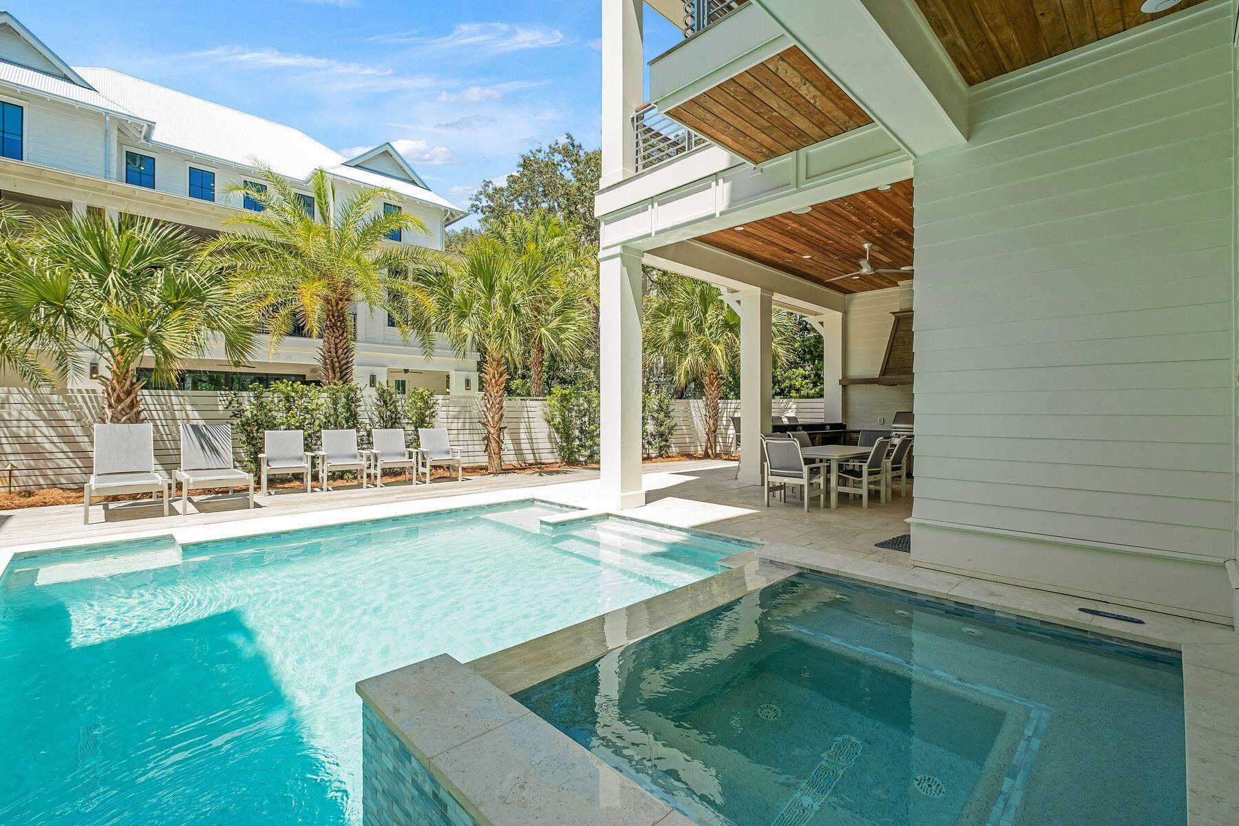 Discover 57 Azalea Street, an exceptional coastal getaway nestled in the heart of Old Seagrove. Just a short stroll -- only 250 steps -- separates you from two convenient public beach access points, making it easy to enjoy the sugar-white sands and emerald waters. This impressive residence is designed for upscale beachside living, offering eight spacious bedrooms and eight-and-a-half bathrooms. Outdoor amenities rival those of a private resort, featuring a sparkling pool, hot tub, fully equipped outdoor kitchen, dining space, bar area, and a rooftop deck with sweeping gulf views. Inside, you'll also find a game room and the added convenience of a private elevator. The first floor is dedicated to entertainment and relaxation, with a generous game room perfect for gatherings. This level also includes a guest suite with its own bathroom, along with a bunk room outfitted with three queen-over-queen bunks and access to a shared bath.

Upstairs on the second level, the main living area blends sophistication with comfort. The chef's kitchen is outfitted with premium stainless steel appliances, custom cabinetry, and a large marble island ideal for hosting. Just beyond, a spacious terrace overlooks the pool and spa, offering a serene setting day or night. The primary suite on this level provides a peaceful retreat, complete with a king bed and a spa-inspired bathroom featuring a soaking tub, oversized walk-in shower, and dual vanities. Additional sleeping space is available with built-in twin-over-twin bunks.

The third floor is thoughtfully designed to provide privacy for guests, featuring another primary suite with a luxurious bath, three additional bedrooms, each with an ensuite bathroom, and a bedroom with two twin beds and its own bath.

Cap off each evening on the rooftop deck, where you can unwind with a drink and take in breathtaking sunset views over the gulf. With its blend of refined design, modern amenities, and prime location, this stunning beach home delivers an unforgettable coastal living experience.