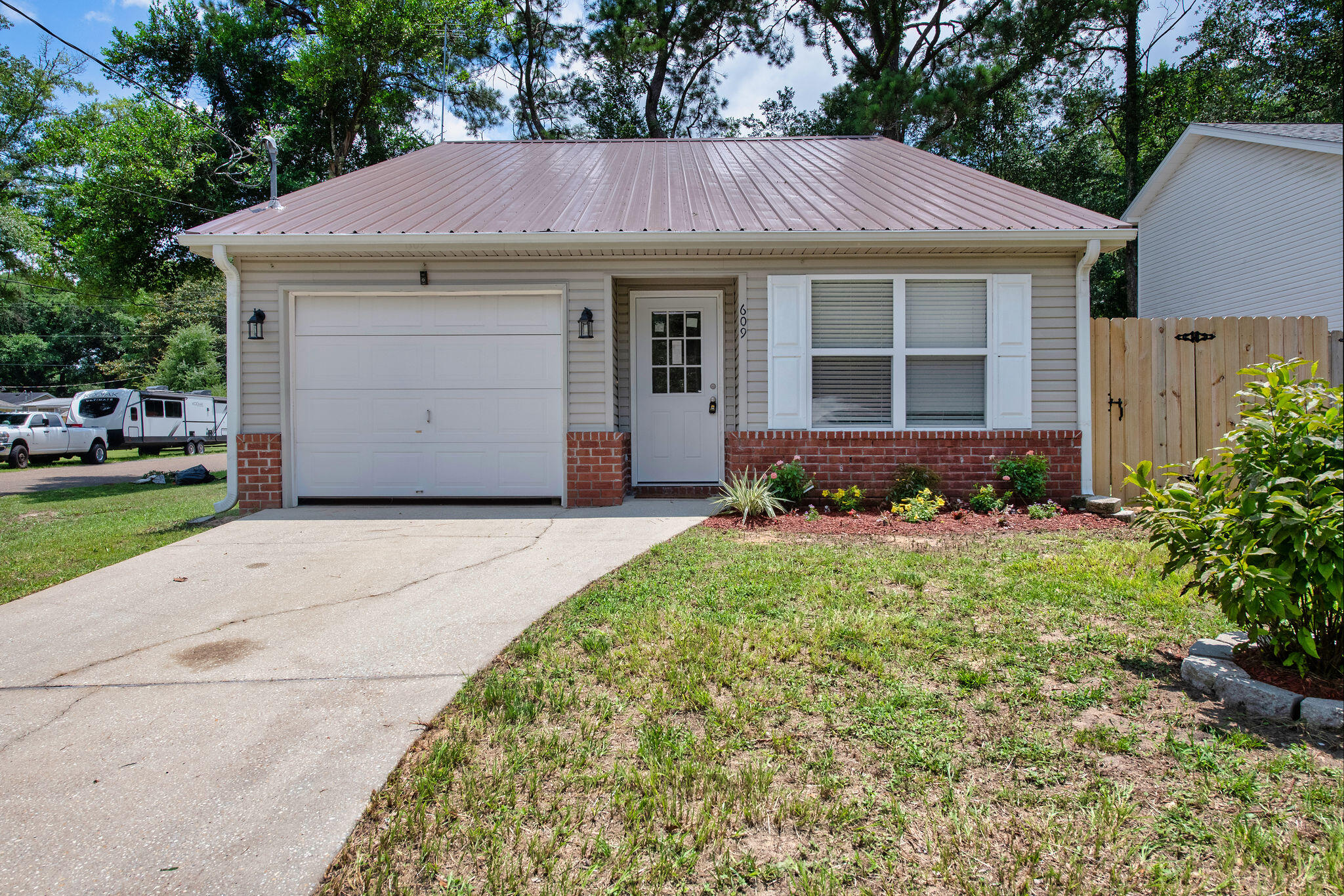 Completely transformed with meticulous attention to detail, this beautifully updated 3-bedroom, 2.5-bath home offers modern finishes, major updates, and an unbeatable location in the heart of Crestview. Situated on a desirable corner lot, this move-in-ready home stands out from the moment you arrive with its inviting curb appeal and the pride of workmanship that makes it truly special.

Recent renovations include a new metal roof, new water heater, fresh interior paint, brand-new flooring, updated lighting, stylish fixtures, and a beautifully refreshed kitchen with new appliances, countertops, and sink. Every room feels bright, clean, and thoughtfully updated, creating welcoming space ready for its next owner.

Ideally located just moments from Twin Hills Park, you'll enjoy easy access to playgrounds, sports fields, walking trails, community events, and outdoor recreation. Located near Ferdon Boulevard, this home offers quick access to shopping, dining, schools, and everyday essentials.

Whether you're a first-time buyer, looking to downsize without sacrificing, or searching for a home where the hard work has already been done, this one checks all the boxes.