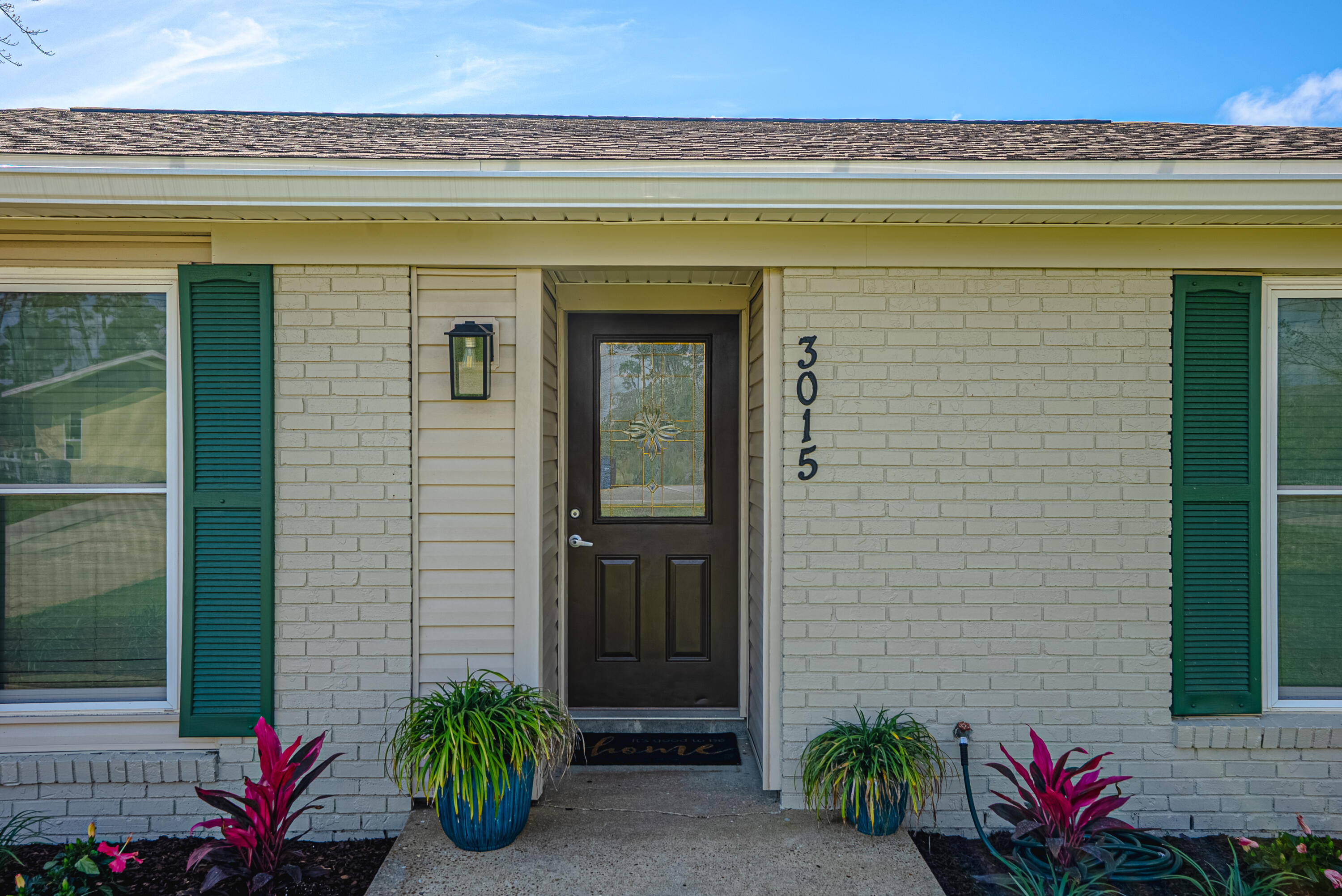 Welcome to 3015 Stanford Rd in Panama City -- a beautifully maintained and thoughtfully updated brick home that combines timeless construction with modern upgrades, all in a convenient and highly desirable central location.

Inside, you'll find a bright and welcoming open living and dining area designed for comfortable everyday living and easy entertaining. Large windows allow natural light to flood the space, creating a warm and airy atmosphere throughout the home. Durable flooring runs throughout the house with no carpet, providing a clean, modern look and low-maintenance lifestyle.

The spacious primary bedroom offers a relaxing retreat and features a generous walk-in closet along with a convenient private half bath. One additional bedroom provides comfortable space for family, guests, or a home office, making the layout both practical and flexible.

This home has been extensively improved with a long list of thoughtful upgrades. Major system updates include a new HVAC system and hot water heater installed in 2022, followed by a new well pump in 2023. In 2024, the kitchen was updated with new appliances, and in 2025 the home received a comprehensive renovation that included a completely new kitchen, updated bathrooms, a redesigned laundry area, new gutters, fresh interior and exterior paint, updated plumbing, electrical improvements, and all new lighting fixtures throughout the home. A new sliding glass door was also installed, providing easy access to the backyard, and a new washer and dryer were added.

The improvements continued in 2026 with a beautifully renovated main bathroom featuring a tub and shower combination with classic subway tile. Outside, the concrete patio has been freshly stained to create an inviting outdoor living space. The shed has been painted to match the home, and new landscaping and plantings enhance the home's curb appeal.

Additional features include a convenient one-car garage and a spacious yard perfect for relaxing, gardening, or entertaining.

Ideally located, this home is just minutes from the new Publix shopping center at SweetBay and close to the shopping, dining, and everyday conveniences along 23rd Street. The beautiful beaches of the Gulf of Mexico are also only about 20 minutes away.

With extensive upgrades, abundant natural light, and a prime location close to everything Panama City has to offer, 3015 Stanford Rd is truly move-in ready and a wonderful place to call home.