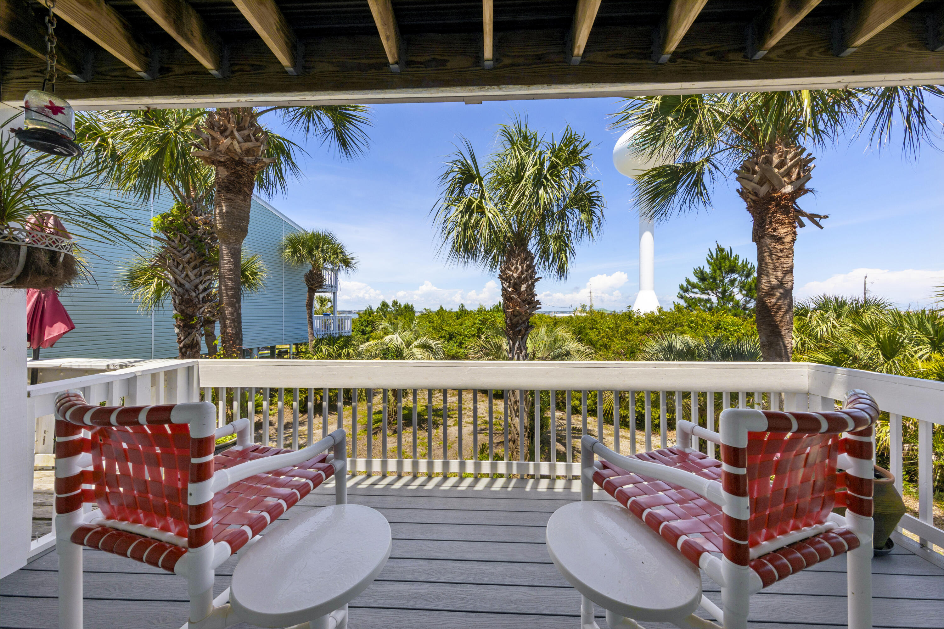 Located in beautiful Navarre Beach, this well-maintained 2-bedroom, 2.5-bath townhouse offers the perfect blend of comfort, functionality, and coastal charm. Recent updates include stunning quartz kitchen countertops and newer appliances, both replaced just two years ago, creating a fresh and modern kitchen space perfect for entertaining or everyday living.

Designed to maximize both space and convenience, the second bedroom features a custom built-in Murphy bed complete with an attached dresser and bookshelf. Upstairs, twin-size built-in bunk beds in the hallway provide additional sleeping space ideal for guests or beach weekends with family and friends.

As you enter the home, you'll appreciate the enclosed mudroom entryway -- perfect for storing beach gear, shoes, and towels after a day on the sand. Foam insulation in the attic adds energy efficiency and year-round comfort.

Enjoy breathtaking morning sunrises and relaxing evening sunsets from four separate decks, offering multiple outdoor spaces to unwind and soak in the coastal atmosphere. Residents also enjoy access to a heated community pool, making this property an exceptional full-time residence, vacation getaway, or investment opportunity in one of Florida's most desirable beach communities.