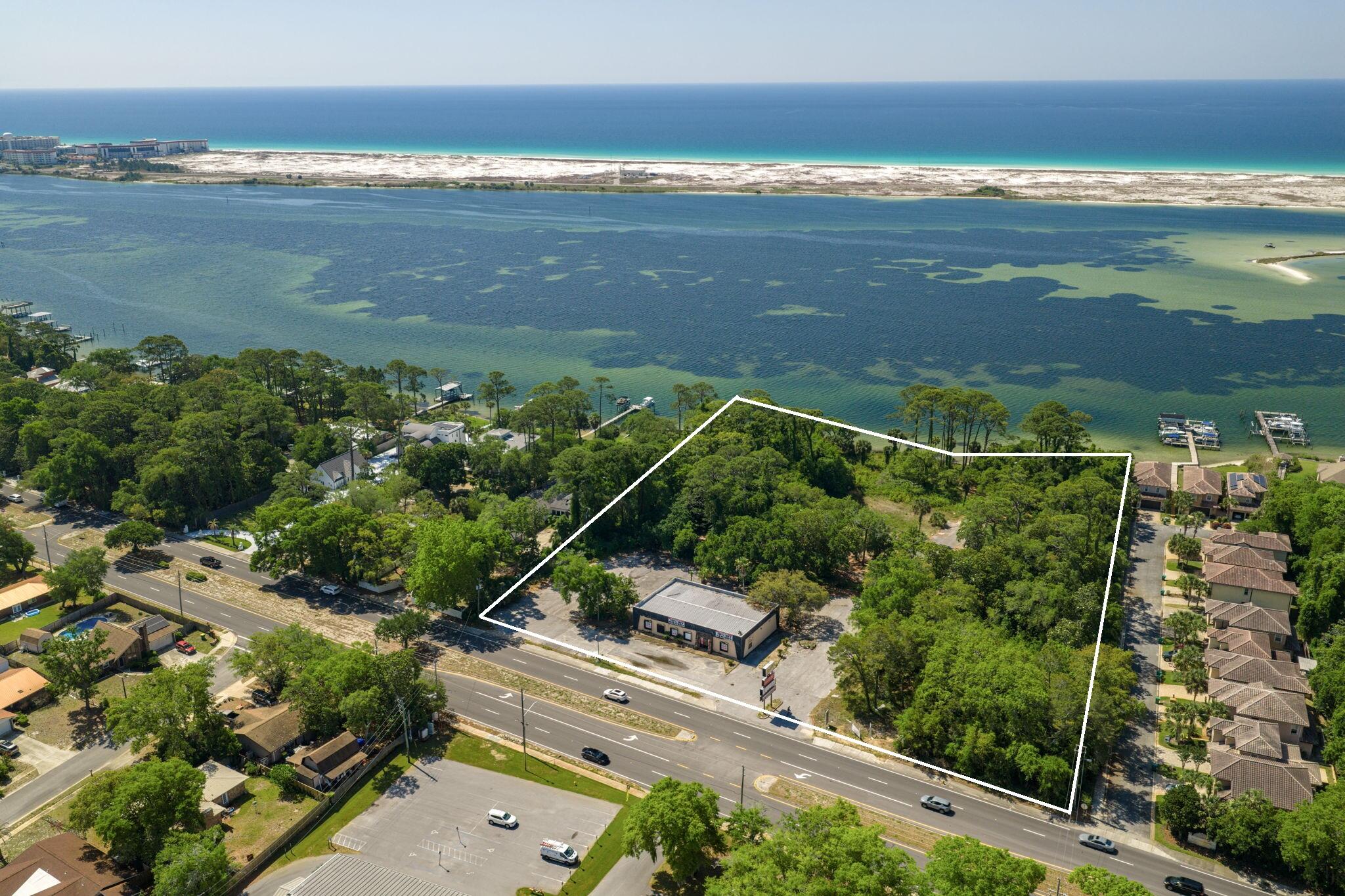 Positioned along Highway 98 with direct frontage and an AADT of 27,000 vehicles, this 4,000 SF retail building sits on a generous 5.03-acre parcel in one of Mary Esther's most active commercial corridors. Offered For Sale at $4,995,000, the property delivers exceptional visibility, strong traffic flow, and rare scale for this stretch of the Miracle Strip Parkway.

Supporting robust year-round demand from both local residents and the steady flow of commuters between Fort Walton Beach, Hurlburt Field, and Navarre. With its expansive acreage, prominent frontage, and flexible retail positioning, the site is well-suited for operators or investors seeking a high-impact location in a tightly held Gulf Coast market. This property represents a standout opportunity to secure significant land, frontage, and long-term commercial potential along one of Northwest Florida's most traveled coastal corridors.