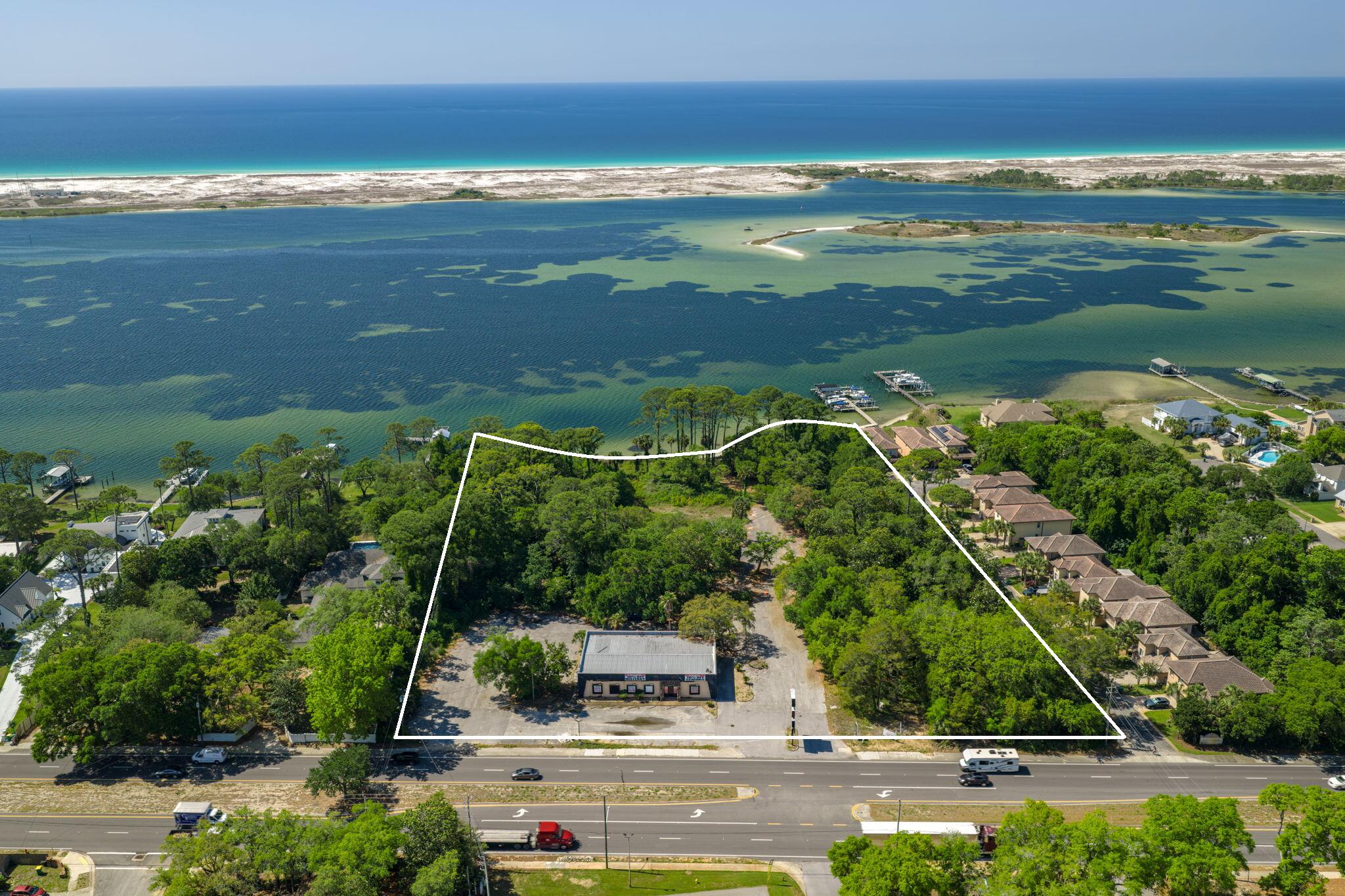 Positioned along Highway 98 with direct frontage and an AADT of 27,000 vehicles, this 4,000 SF retail building sits on a generous 5.03-acre parcel in one of Mary Esther's most active commercial corridors. Offered For Sale at $4,995,000, the property delivers exceptional visibility, strong traffic flow, and rare scale for this stretch of the Miracle Strip Parkway.

Supporting robust year-round demand from both local residents and the steady flow of commuters between Fort Walton Beach, Hurlburt Field, and Navarre. With its expansive acreage, prominent frontage, and flexible retail positioning, the site is well-suited for operators or investors seeking a high-impact location in a tightly held Gulf Coast market. This property represents a standout opportunity to secure significant land, frontage, and long-term commercial potential along one of Northwest Florida's most traveled coastal corridors.