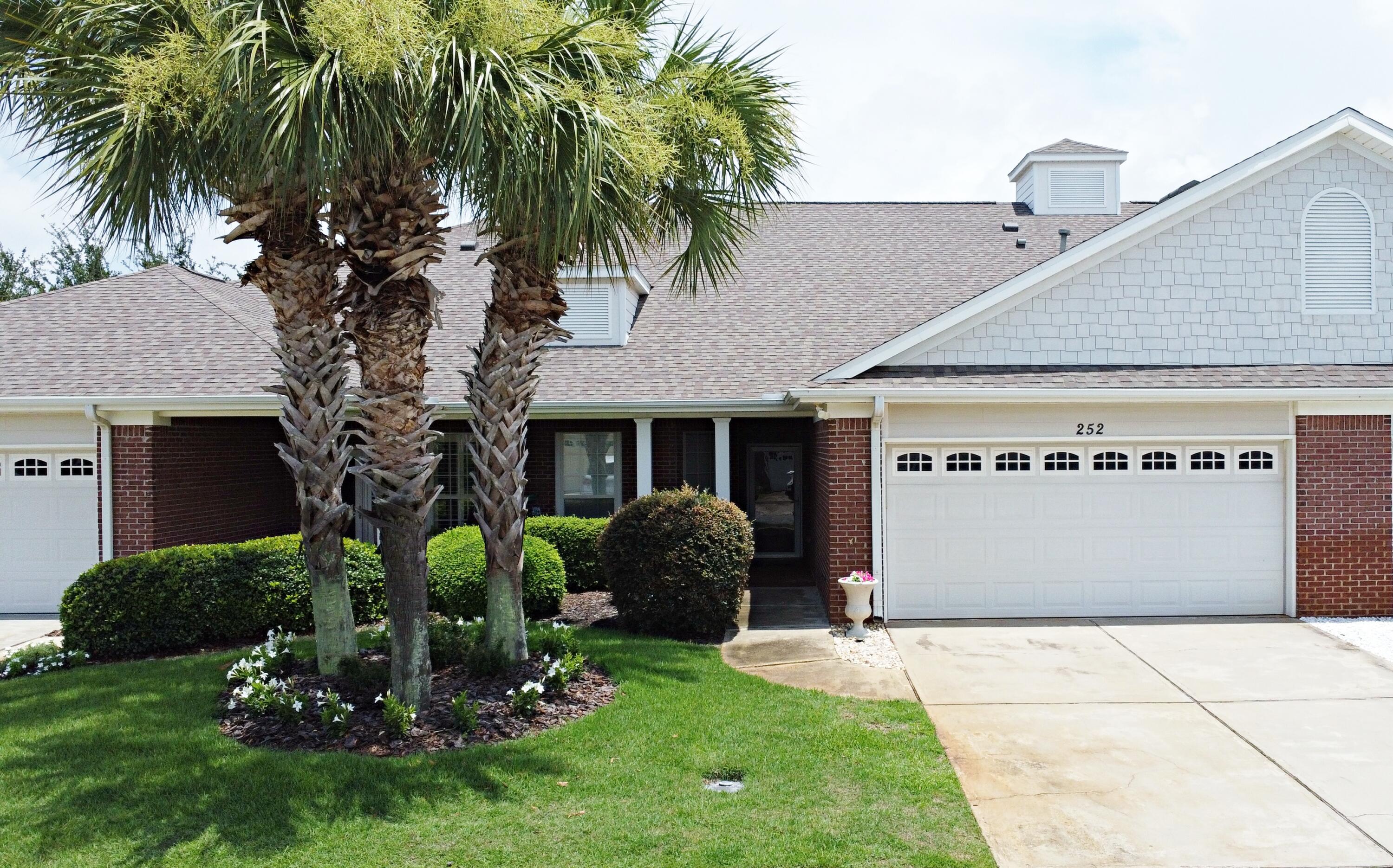 Discover the charm and convenience of this centrally located townhome in Destin! Whether you're searching for a primary residence, a second home, or an investment property, this 3 bedroom 2 bath home is a versatile choice that fits a variety of needs.The kitchen offers a clear view of both the dining and living areas, making it perfect for entertaining or keeping an eye on family activities. There's ample room in the living room for a sectional sofa. The cozy gas fireplace adds warmth and ambiance for those cool winter nights. Enjoy the privacy of a master bedroom featuring a walk-in closet and an en-suite bathroom with double vanities, a shower, and a soaking tub. The screened in back porch could be a peaceful spot to start your day or for unwinding in the evening. This Destin townhome