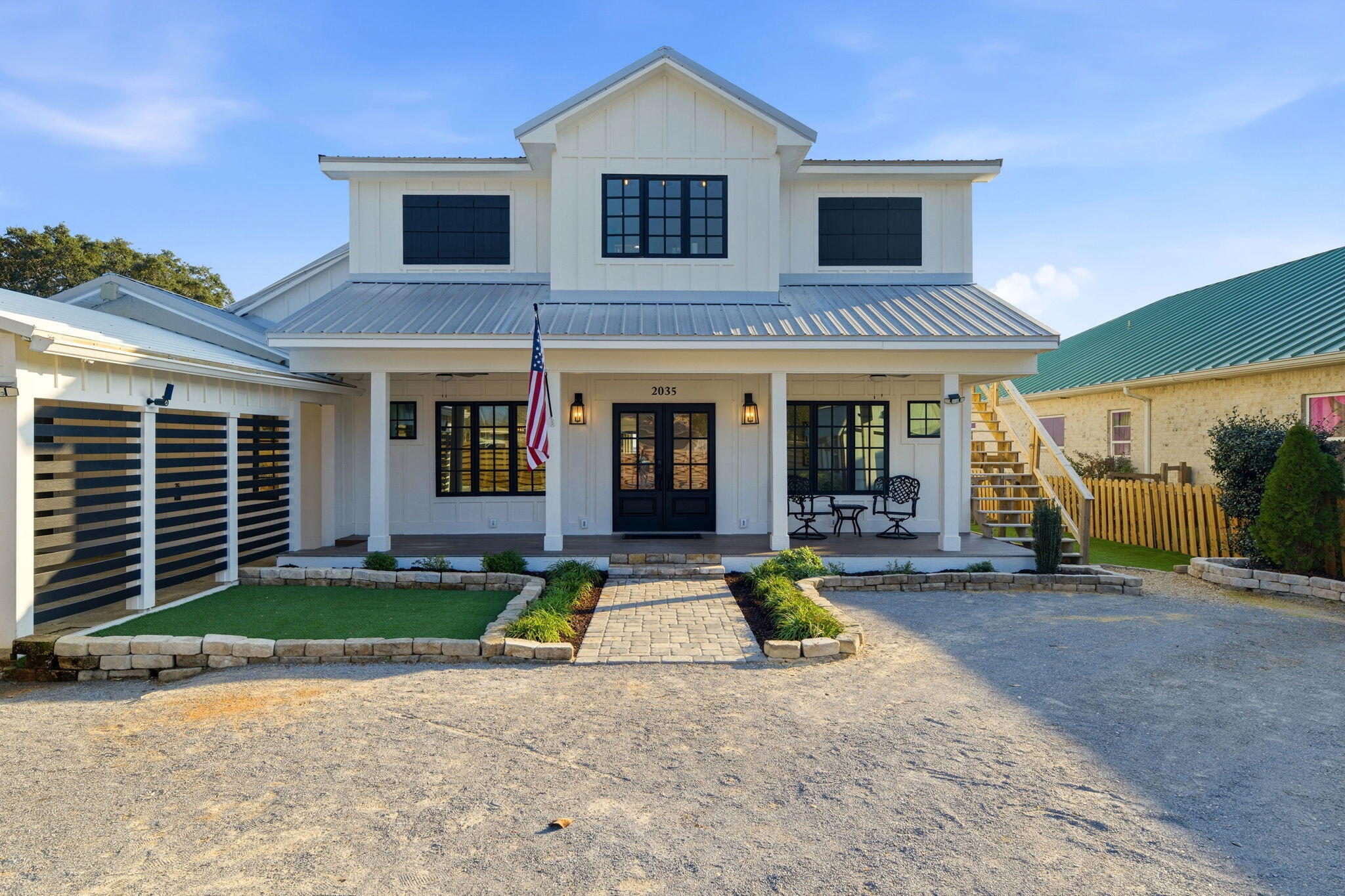 Waterfront Luxury Meets Custom Craftsmanship at 2035 Wind Trace Rd, Navarre FL. Welcome to your private soundfront retreat on the beautiful shores of Navarre! This extraordinary, newly rebuilt coastal home offers 3,500 square feet of custom living space, featuring 4 bedrooms in the main residence plus a fully equipped upstairs guest apartment with separate interior and exterior access—perfect for multi-generational living, guests, or income-producing potential. Perched on nearly half an acre with 75+ feet of waterfront and no HOA, the property features an approximately 300-foot dock with two boat lifts—one of which is covered. Relax in your saltwater pool or entertain in the spacious gazebo while enjoying panoramic views of Santa Rosa Sound. This home has been completely taken down to the studs and remodeled with luxury and efficiency in mind. Highlights include all-new HVAC (including dual Samsung 18 SEER heat pumps and mini-splits), new electrical with 300-amp service, new PEX plumbing, new high-grade cabinets, appliances, LVP flooring, drywall, doors, trim, and sound-insulated walls. The R-2 zoning allows for even greater flexibility, including short-term rental or multi-unit options. This home features 4 individual lockouts. With the final touches left for the buyer to personalize, this is a rare opportunity to own a waterfront masterpiece designed for comfort, style, and coastal living.