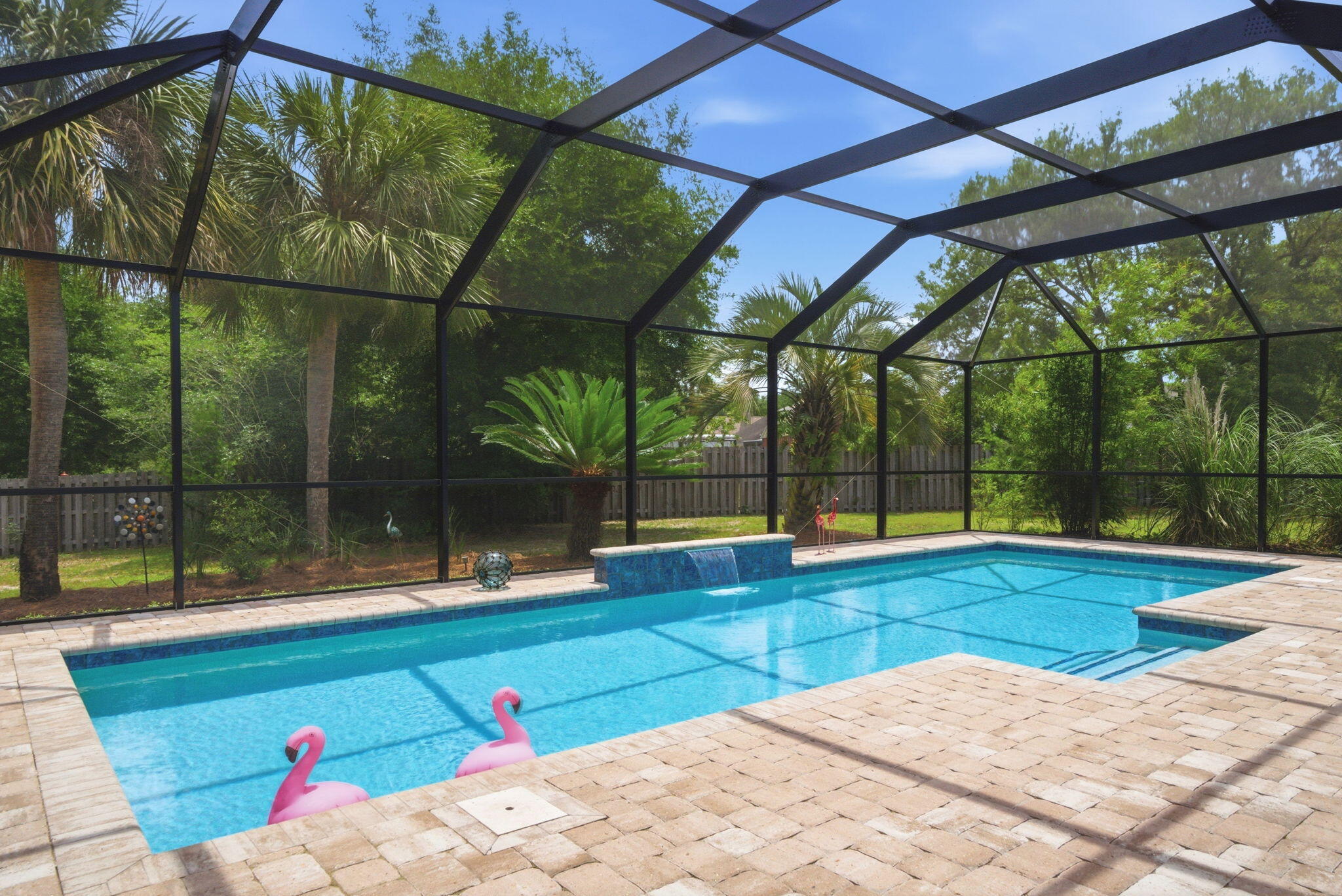 *NEW ATTRACTIVE PRICE ADJUSTMENT AND A NEW ROOF AT CLOSING WITH ACCEPTABLE OFFER* 

NEW PHOTOS UPLOADED 5/23 DUE TO NEW VACANCY!! 

Tucked away on a rare 0.61-acre homesite at the end of a private cul-de-sac, this property offers the kind of space, privacy, and peaceful surroundings that are becoming harder to find. Backed by wooded natural scenery, the setting feels quiet and secluded while still being conveniently located.

The extended resurfaced driveway provides plenty of room for multiple vehicles, guests, or recreational toys, and the oversized side-entry garage adds even more storage and functionality. Inside, the home features three spacious bedrooms plus a large bonus room currently used as a bright art studio. With abundant natural light and beautiful views overlooking the pool, this flexible space could easily serve as a home office, den, playroom, or creative studio depending on your needs. 
The home has been thoughtfully remodeled to create a more open connection between the kitchen and living area, allowing the main living space to feel bright, inviting, and ideal for entertaining. All kitchen appliances convey with the sale, making the home move-in ready.

Step outside to enjoy your private backyard retreat featuring a heated pool, new enclosure, and additional paver space--perfect for relaxing, entertaining, or enjoying Florida's beautiful weather year-round.

Additional highlights include:

" Solar panels that will be fully paid off at closing - a valuable bonus for future energy savings

" A storage shed that conveys as-is

" A large laundry room with plenty of space to add cabinets, folding counters, or even a work station

" A formal dining room located just off the foyer for gatherings and special occasions

Homes with this unique floor plan and oversized lot rarely come available in this area. Being located on a dead-end road with no cut-through traffic means the cul-de-sac is shared only among neighbors, creating a peaceful environment.

All of this with a low HOA fee of just $595.50 annually, and convenient access to the beach, golf course, and nearby amenities.

The sellers are also offering flexible closing options, whether you need to move quickly or prefer a later closing timeline. If you've been searching for space, privacy, and a truly unique property, this home is one you won't want to miss.

If you're a buyer reading this, please ask your agent for all of the documents in the MLS prior to your visit. Helpful information is there