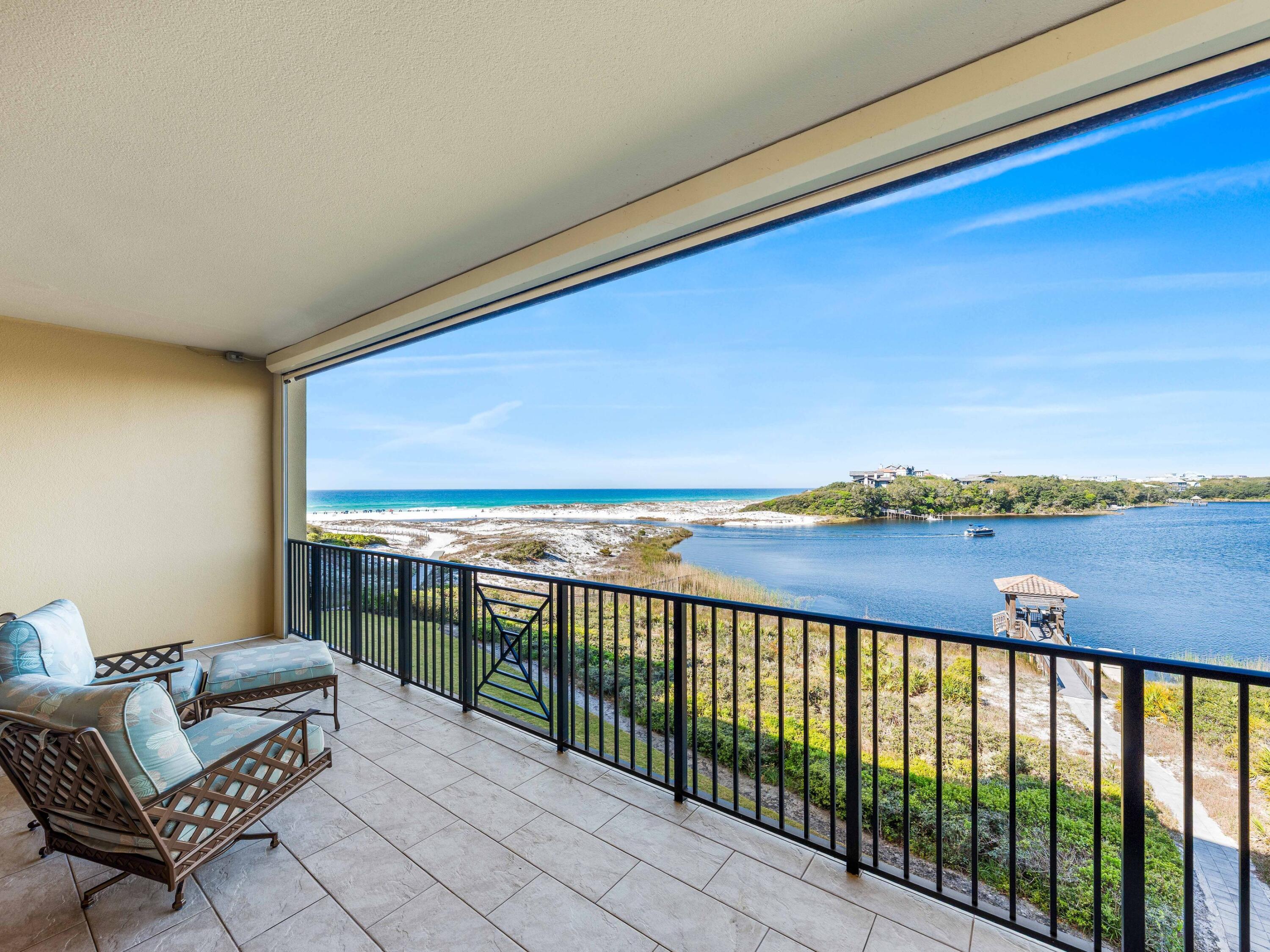 Introducing an exceptional residence that offers breathtaking views of both the Gulf and Lake, where refined luxury meets the rare beauty of a coastal dune lake. Situated within the exclusive gated community of Sanctuary by the Sea, this nearly 4,000-square-foot, single-level property provides sweeping, unobstructed views of the Gulf and Big Redfish Lake from one of the most coveted vantage points along 30A.
Upon arrival, the experience is unforgettable.The sense of arrival unfolds upon entry, where beautifully curated interiors and architectural details create a sense of effortless flow. Expansive living spaces are framed by floor-to-ceiling views and enhanced by ten-foot ceilings, sophisticated finishes, and a calming coastal palette. Recent refreshing includes new carpeting in bedrooms, cabinet updates and furnishing enhancements. 
At the heart of the residence, the spacious living room with fireplace seamlessly opens to an oversized private terrace complete with remote screens--an outdoor sanctuary designed for dining, entertaining, and enjoying the colors of the Gulf sunsets. This is indoor-outdoor living at its finest.

The chef's kitchen is both functional and striking, appointed with Viking appliances, dual islands, and ample cabinetry. A wet bar and a separate dining area help make entertaining easy.

Designed for comfort and privacy, this home features four distinct sleeping spaces and three ensuite baths. One of the rooms includes custom-built bunks plus a second living/media space. The primary suite is spacious and includes multiple sitting areas and private access to the waterfront porch. A spa-inspired bathroom with soaking tub and large shower evokes a sense of relaxation and escape.

With its coveted southwest orientation, this residence is perfectly positioned to capture some of the most breathtaking sunset views along the Emerald Coast. Offered furnished and impeccably styled, it is ready to be enjoyed immediately as a primary or vacation home.

Sanctuary by the Sea is located on 23 pristine Gulf-front acres between the Gulf and Big Redfish Lake--one of the most rare and protected coastal dune lake environments in the world. Residents have access to a range of amenities, including multiple pools, private beach access, a fitness center, a golf simulator, and more. These amenities are conveniently located within walking distance of 30A and the shops and restaurants of Grayton Beach, Watercolor, and Seaside. Don't miss this special opportunity!