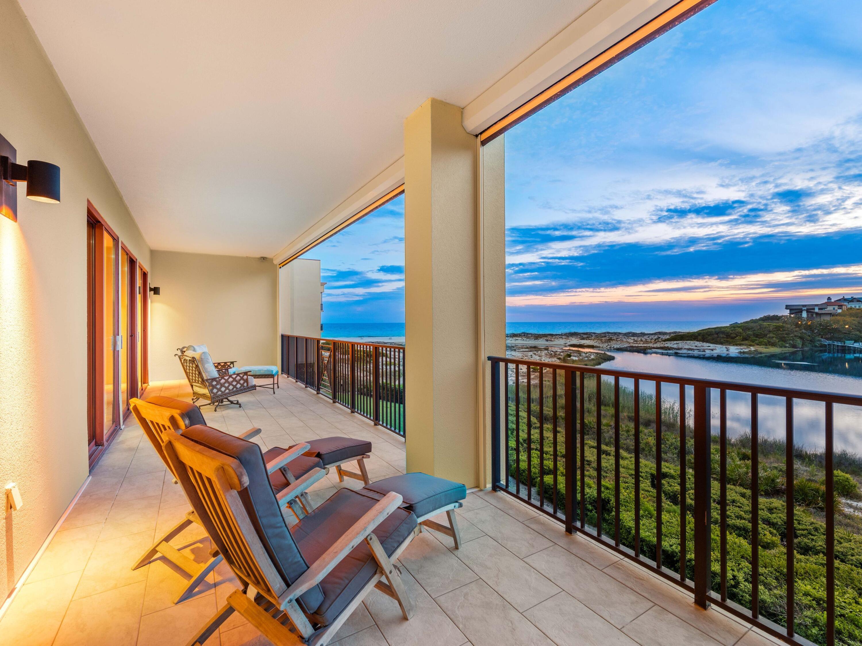 Introducing an exceptional residence that offers breathtaking views of both the Gulf and Lake, where refined luxury meets the rare beauty of a coastal dune lake. Situated within the exclusive gated community of Sanctuary by the Sea, this nearly 4,000-square-foot, single-level property provides sweeping, unobstructed views of the Gulf and Big Redfish Lake from one of the most coveted vantage points along 30A.
Upon arrival, the experience is unforgettable.The sense of arrival unfolds upon entry, where beautifully curated interiors and architectural details create a sense of effortless flow. Expansive living spaces are framed by floor-to-ceiling views and enhanced by ten-foot ceilings, sophisticated finishes, and a calming coastal palette. Recent refreshing includes new carpeting in bedrooms, cabinet updates and furnishing enhancements. 
At the heart of the residence, the spacious living room with fireplace seamlessly opens to an oversized private terrace complete with remote screens--an outdoor sanctuary designed for dining, entertaining, and enjoying the colors of the Gulf sunsets. This is indoor-outdoor living at its finest.

The chef's kitchen is both functional and striking, appointed with Viking appliances, dual islands, and ample cabinetry. A wet bar and a separate dining area help make entertaining easy.

Designed for comfort and privacy, this home features four distinct sleeping spaces and three ensuite baths. One of the rooms includes custom-built bunks plus a second living/media space. The primary suite is spacious and includes multiple sitting areas and private access to the waterfront porch. A spa-inspired bathroom with soaking tub and large shower evokes a sense of relaxation and escape.

With its coveted southwest orientation, this residence is perfectly positioned to capture some of the most breathtaking sunset views along the Emerald Coast. Offered furnished and impeccably styled, it is ready to be enjoyed immediately as a primary or vacation home.

Sanctuary by the Sea is located on 23 pristine Gulf-front acres between the Gulf and Big Redfish Lake--one of the most rare and protected coastal dune lake environments in the world. Residents have access to a range of amenities, including multiple pools, private beach access, a fitness center, a golf simulator, and more. These amenities are conveniently located within walking distance of 30A and the shops and restaurants of Grayton Beach, Watercolor, and Seaside. Don't miss this special opportunity!
