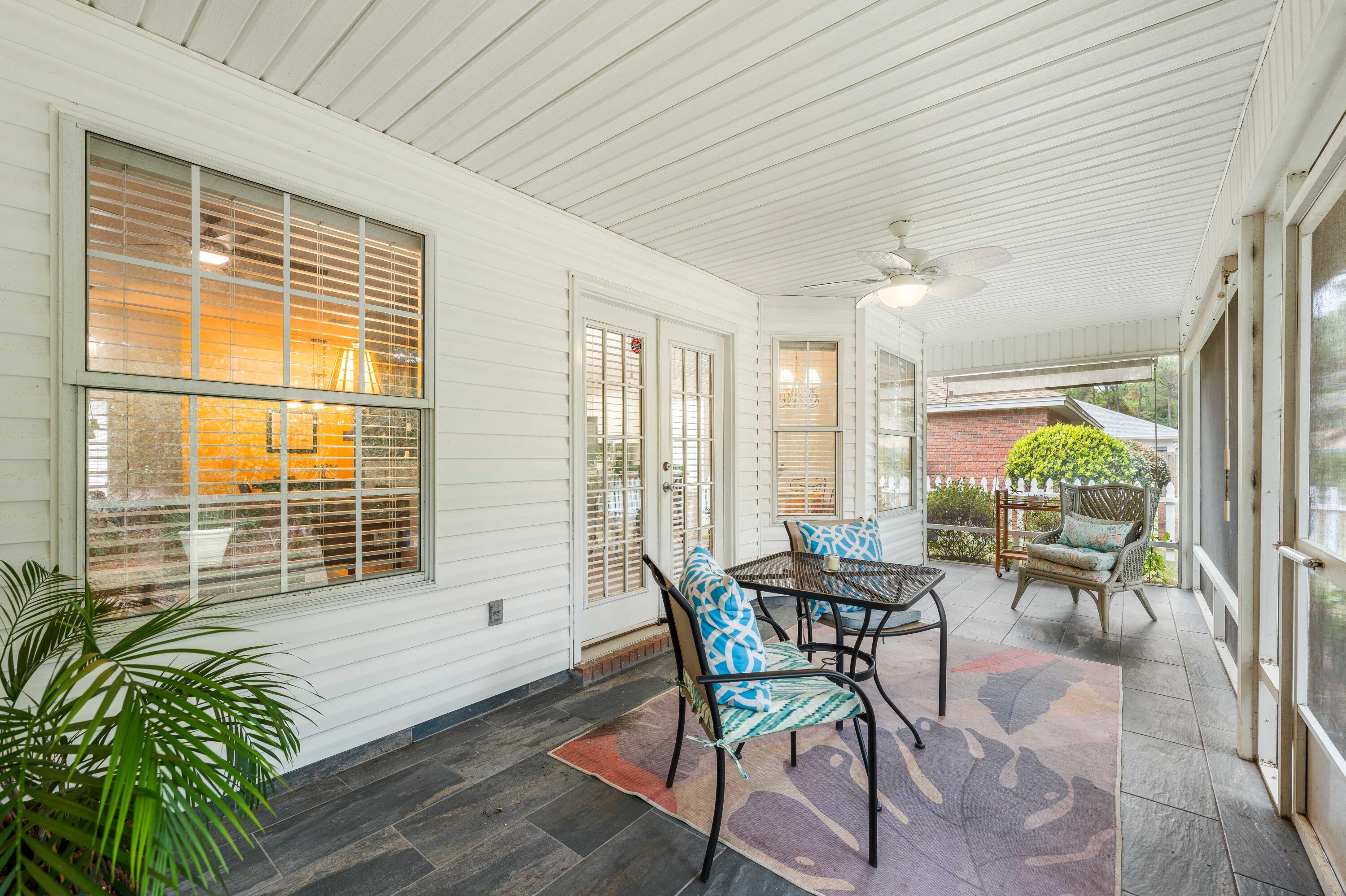 Enjoy the perfect blend of privacy and convenience in this charming 3-bedroom home, ideally located near shopping, dining, beaches, and entertainment. Tucked away in a peaceful setting, this property offers a true sense of retreat while keeping everything you need close by.

The owner's favorite feature is the shaded, screened-in patio overlooking a fenced backyard--perfect for relaxing or entertaining. The neighborhood enhances the lifestyle with amenities including a pool, tennis courts, playground, and a fishing dock right on the bay, where you can enjoy stunning sunsets, peaceful walks, or watch boats drift by.

Inside, the home is designed for both comfort and entertaining, featuring a formal dining area and an eat-in kitchen that flows seamlessly into the living room. The kitchen showcases beautiful granite countertops and comes fully equipped with a new oven, side-by-side refrigerator, dishwasher, microwave, plus a washer and dryer for added convenience.

This home truly checks all the boxes--schedule your showing today!