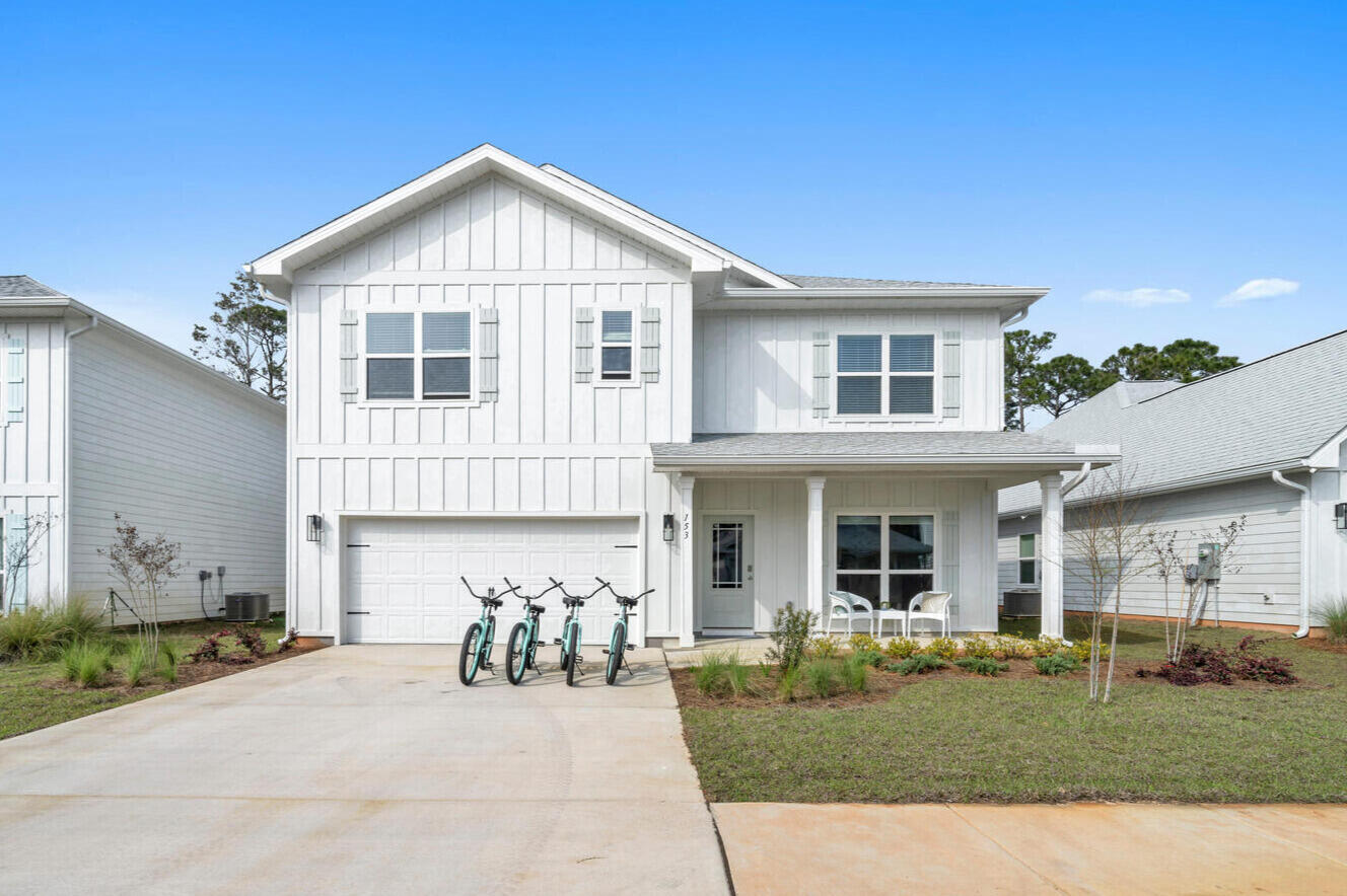 Nestled in a quiet cul-de-sac with protected forest surrounding you, this gorgeous, like-new home is a peaceful sanctuary for those who want to be near 30A while enjoying a quieter, more private atmosphere. Thoughtfully designed with an expansive floor plan, there is an abundance of room for everyone to relax and find their own space. The heart of the residence features a bright, open-concept kitchen and family room that flows effortlessly to the back porch--the perfect spot for morning coffee overlooking serene conservation views. For your convenience, the garage is equipped with an installed Tesla charging port, making it move-in ready for modern electric vehicle owners. This prime location offers a quick ~5-minute drive to the famous white-sand beaches and turquoise waters of Santa Rosa Beach. Whether you are seeking a permanent family haven or a sophisticated second home, you are just minutes away from the very best of 30A, Grand Boulevard, and Gulf Place. This is a rare opportunity to own a move-in-ready retreat tucked away from the crowds but perfectly positioned near the waves. Grand Boulevard, and Gulf Place. This is a rare opportunity to own a move-in-ready retreat tucked away from the crowds but perfectly positioned near the waves.