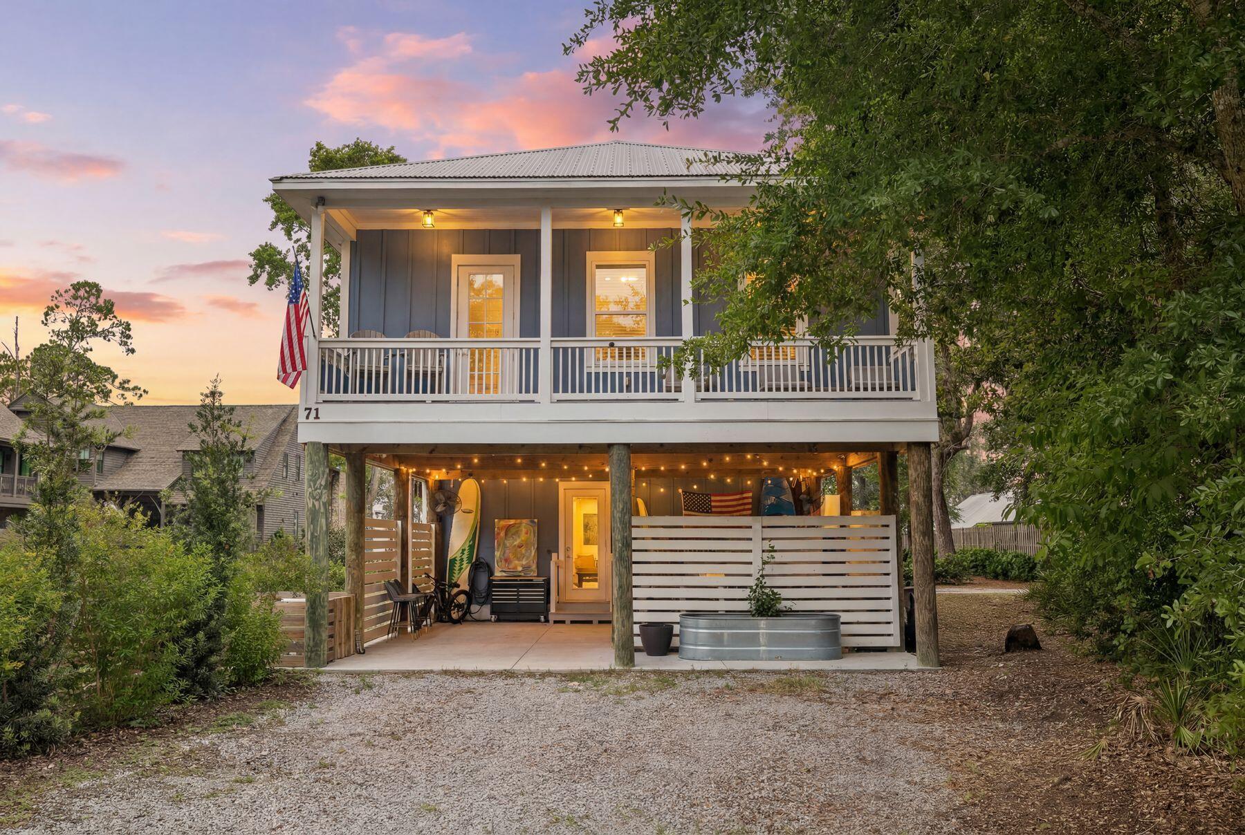 Sweeping views of Choctawhatchee Bay, peaceful surroundings and easy access to the white-sand beaches of 30A create an exceptional setting for this thoughtfully updated Magnolia Beach residence in the highly sought-after Point Washington area. Framed by mature oaks and positioned to capture unforgettable sunsets, this three-bedroom, two-and-a-half-bath home offers a relaxed coastal lifestyle with inviting indoor and outdoor living spaces. Spanning approximately 2,416 square feet, the well-designed floor plan places two guest bedrooms, a full bath and laundry area on the first living level, while the upper floor opens into a light-filled great room beneath vaulted ceilings. Luxury vinyl plank flooring, quartz countertops and stainless steel appliances complement the kitchen, while expansive windows draw in natural light and showcase the bay views beyond. The spacious primary suite provides a peaceful retreat, while a second south-facing balcony offers a quiet place to enjoy the sounds of nature beneath the canopy of surrounding trees. Since purchase, the home has been thoughtfully enhanced with approximately 270 square feet of additional downstairs living space, new flooring, an updated master bathtub, refreshed countertops, a new kitchen sink and dishwasher, updated ceiling fans throughout and a Culligan water filtration system, providing added comfort and convenience for years to come. Covered parking and generous outdoor living areas create additional space to gather, unwind or store beach gear after a day along the coast. With Choctawhatchee Bay just outside your window and the renowned beaches, dining and attractions of 30A only minutes away, this home offers an outstanding opportunity for full-time living or a coastal getaway in one of Point Washington's most desirable locations