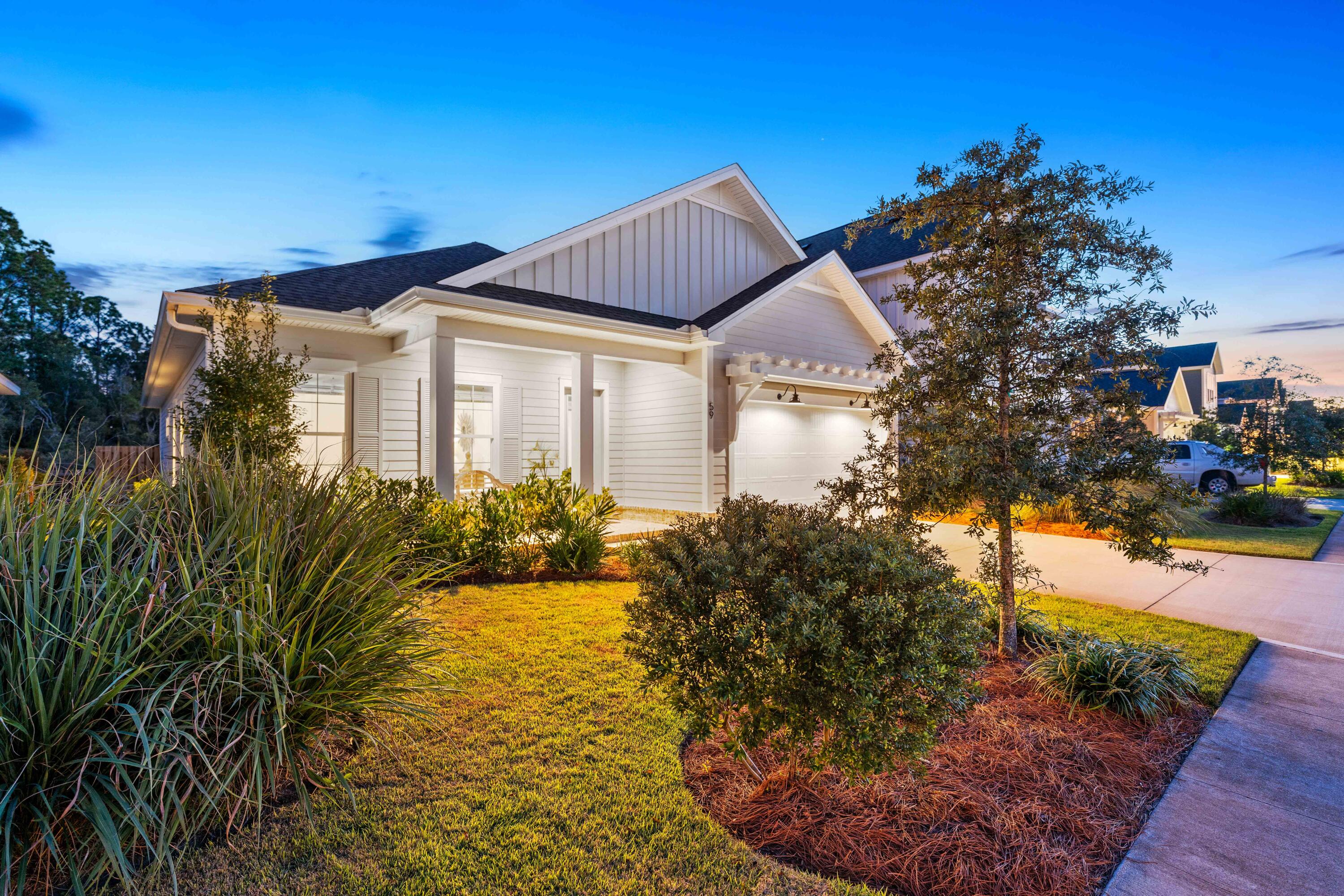 59 Suwannee Dr, Inlet Beach, FL 32461 | Watersound Origins Home for Sale | Longleaf Park
Discover refined coastal living in this beautifully upgraded 1,832 sq ft Bella Plan home, nestled within the sought-after Longleaf Park neighborhood inside Watersound Origins -- one of Northwest Florida's most prestigious master-planned communities. Whether you're searching for a primary residence, second home, or investment property near Rosemary Beach, Alys Beach, and Seaside FL, this home delivers an exceptional blend of quality craftsmanship, modern upgrades, and resort-style community amenities.

About the Home

From the moment you enter, soaring 10-foot ceilings and 8-foot interior doors set a tone of openness and elegance. The chef-inspired kitchen is a true showpiece, featuring quartz countertops, soft-close cabinetry with crown molding, and custom-painted cabinets. Premium Bosch appliances -- including an exhaust vent hood and a convenient microwave drawer -- make cooking a pleasure. Thoughtful upgrades throughout include woven shade window and door treatments that enhance both privacy and style.
Step outside to your screened-in porch and take in the peaceful surroundings -- the fully fenced backyard backs directly up to a natural wooded buffer, offering rare privacy and a serene, nature-filled backdrop that feels worlds away from the everyday. Whether you're sipping morning coffee or unwinding at sunset, this outdoor space is a true sanctuary. The spacious two-car garage provides ample room for vehicles, golf carts, and storage, while the generous primary closet keeps your wardrobe beautifully organized. Pull-down attic access adds even more flexible storage for seasonal items and beyond.

Community Amenities at Watersound Origins

Living at Watersound Origins means access to a lifestyle most people only dream of. The Village Commons serves as the heart of the community, featuring a resort-style pool and a fully equipped fitness center. Tennis and pickleball courts, scenic nature trails, and dock access to the pristine, spring-fed Lake Powell offer year-round outdoor recreation. Golf enthusiasts will love the unlimited golf privileges included with residency on the community's beautifully maintained course. Wide greenspaces and well-maintained common areas make this a neighborhood where neighbors truly connect.

Unbeatable Location Near 30A & Inlet Beach

Situated in Longleaf Park, this home is just a short walk or golf cart ride from Publix grocery and Watersound Town Center -- a charming hub of dining, shopping, and community events right outside your door. You're also minutes from the sugar-white sands and emerald waters of the Gulf of Mexico, with easy access to the famed Scenic Highway 30A corridor, including Rosemary Beach, Alys Beach, and Seaside FL. For those craving a dedicated beach experience, a St. Joe Beach Club membership is available for purchase as a new resident, granting exclusive Gulf-front access.

Why Buy in Watersound Origins?

Watersound Origins consistently ranks among the top master-planned communities on the Emerald Coast, attracting buyers who want walkability, world-class amenities, and a strong sense of community -- all within minutes of some of Florida's most beautiful beaches. Homes in Longleaf Park are in high demand, and this upgraded Bella Plan is a rare opportunity to own in one of the community's most walkable and well-positioned neighborhoods.
Don't miss your chance to own a piece of the coveted Watersound Origins lifestyle. Schedule your private showing today.