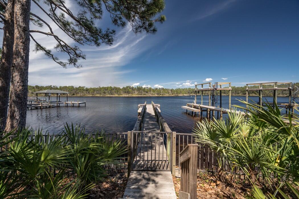Buy your piece of paradise in this incredible beach side community with modern beach custom homes! Grande Pointe at Inlet Beach offers you the opportunity to be near coveted Hwy 30A while having direct access to Lake Powell, the largest coastal dune lake in North America, directly from your neighborhood dock!! Easily traverse Lake Powell via kayak or paddle board straight to the emerald waters directly from your neighborhood!! In addition to the incredible access to Lake Powell, you are just a golf cart ride away to the largest public beach access the area has to offer!! After a day in the sun, continue your golf cart ride to 30A Avenue where you have shopping, restaurants and live entertainment!! Opportunities to build in this community are scarce, don't miss out!!