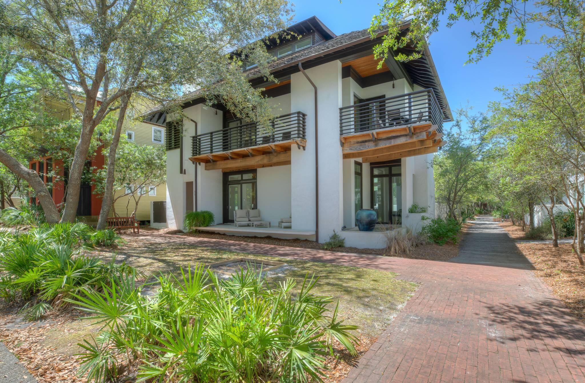 Welcome to 71 Atticus--where mornings start with a walk to coffee, afternoons unfold poolside, and evenings are just steps from Rosemary Beach's best dining and entertainment. This 4BR/3.5BA home is designed for easy coastal living, featuring inviting indoor-outdoor spaces, a private pool, and room to gather with family and friends. Whether you're seeking a second home, a full-time residence, or a high-performing rental, this property delivers the quintessential 30A lifestyle with a projected $200K in annual income. Outdoor living in this home is very inviting with three private porches, a private pool terrace, an outdoor fireplace, and a grilling area that make the home easy to enjoy in every season. The second-floor primary suite includes a private bath, while the third-floor bunkroom with its own bath adds flexibility for guests. Owners in Rosemary Beach enjoy access to 4 community pools, an owners-only pool area, 9 private beach walkovers, and the shops and restaurants of the Town Center nearby. 71 Atticus is being sold furnished and rental-ready, with some small owner exclusions.