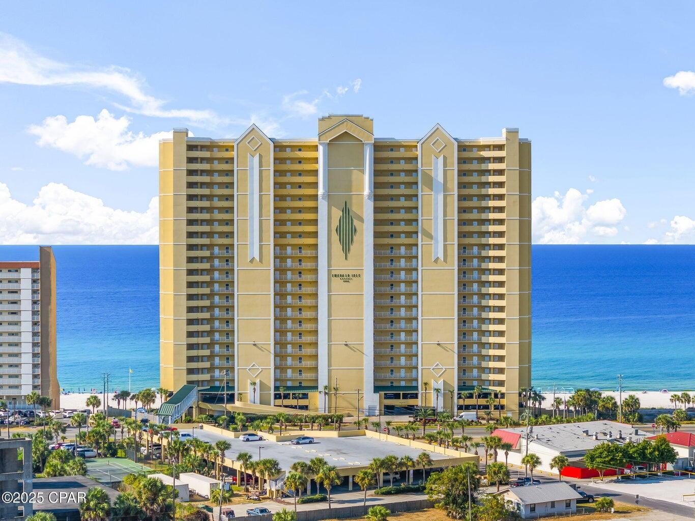 Welcome to Emerald Isle Resort, one of the most sought-after Gulf-front communities on the quiet West End of Panama City Beach. Known for its exceptional management and meticulous maintenance, Emerald Isle offers resort-style living with premier amenities including two pools (one seasonally heated), hot tub, fitness center, sauna, and ample parking with an additional parking garage.

Unit 2104 is a spacious 2-bedroom, 2-bath Gulf-front condominium that includes a deeded garage parking space conveniently located on the 3rd floor. This well-designed unit features an oversized 10x28 balcony offering breathtaking sunrise views to the east and spectacular sunset views to the west. The Gulf-front primary suite includes direct balcony access, creating the perfect coastal retreat.

Interior features include stainless steel appliances, premium kitchen counters and vanity tops, reverse osmosis water system, a walk-in shower in the primary bath, and a newly updated guest bath tub/shower combination. A private exterior storage closet located just outside the entry door provides additional convenience for beach gear and owner storage.Offered unfurnished, this condo presents an excellent opportunity to customize and update to your own personal style with new flooring and paint. Whether you are seeking a primary residence, second home, or investment property, this unit offers outstanding potential with projected rental income up to $40,000 annually. BUYER TO VERIFY ALL IMPORTANT DETAILS