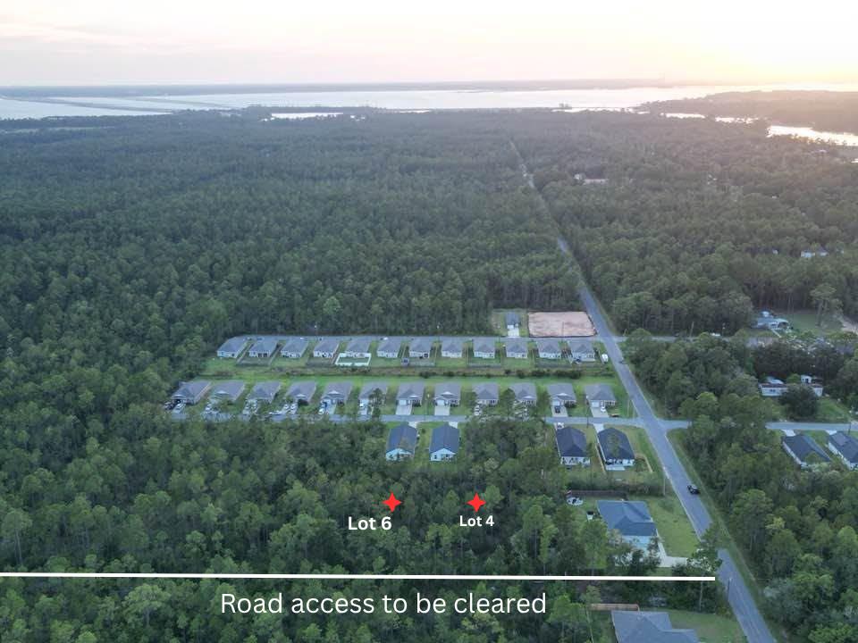 lot 6- Build Your Custom Home in an Established Neighborhood 
Don't miss this opportunity to own Lot 4, Lot 6, or both together in an established neighborhood with public water and sewer available. Lots may be purchased together or separately, offering flexibility for homeowners, builders, or investors. Zoned R-1, these parcels are designated for site-built homes only (manufactured homes are not permitted). A Wetland Study will be required prior to development. The property is located in Flood Zone X, meaning it is not within a designated flood hazard area. An access agreement with the Public Works/Road & Bridge Department will be required, and the buyer will be responsible for clearing the access. While public water and sewer are available, there are no existing sewer laterals, as the area is served by a force main. WANT BOTH LOTS SEE mls 10008500
