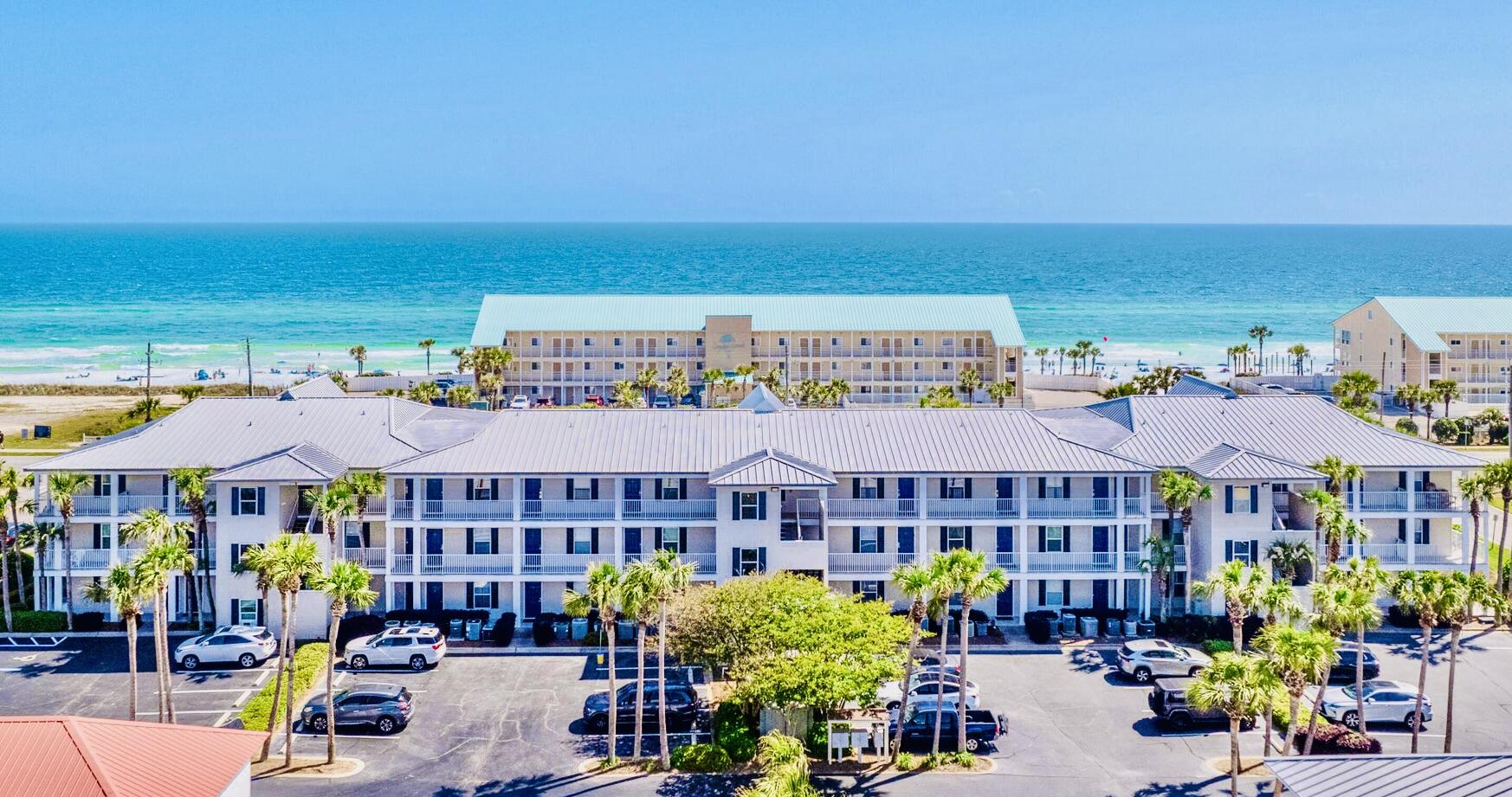 This third-floor unit is located in Grand Caribbean East - a three-story property settled in the quiet and desirable Crystal Beach area of Destin. This upgraded two-bedroom, two-bath unit features wood look vinyl plank flooring, open main living areas, a large private balcony, and beautiful Gulf views. With a large master suite, guest suite, and hallway bunks, there is plenty of room for guests. The kitchen features wood cabinetry, granite countertops, a breakfast bar, and a large pantry closet. Grand Caribbean amenities include well-kept grounds, a pool and hot tub, grilling and picnic area, and large private parking lot. The beaches and beautiful emerald green waters of the Gulf are easily accessed by two dedicated walkways directly across the street.