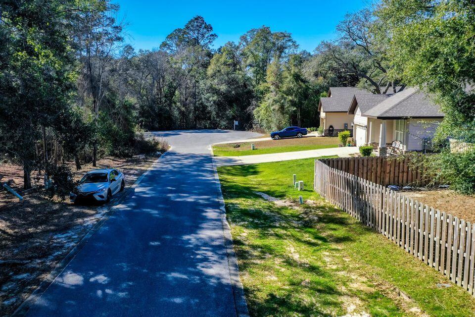 Now is your chance to build your dream home in Freeport, Florida.  This is the largest remaining lot in the subdivision. This 1/2 acre wooded lot is situated at the end of the cul-de-sac and is perfect for a nature enthusiast. Lot 63 next door is also available and perfect for Builders, save $10,000 if bought together. Canopies of Freeport has a low HOA fee of $125 per quarter to cover common areas and the neighborhood pool! Freeport offers residents a suburban-rural mix feel, close to the beaches but without heavy traffic. While we believe all information to be accurate, buyers verify all information.