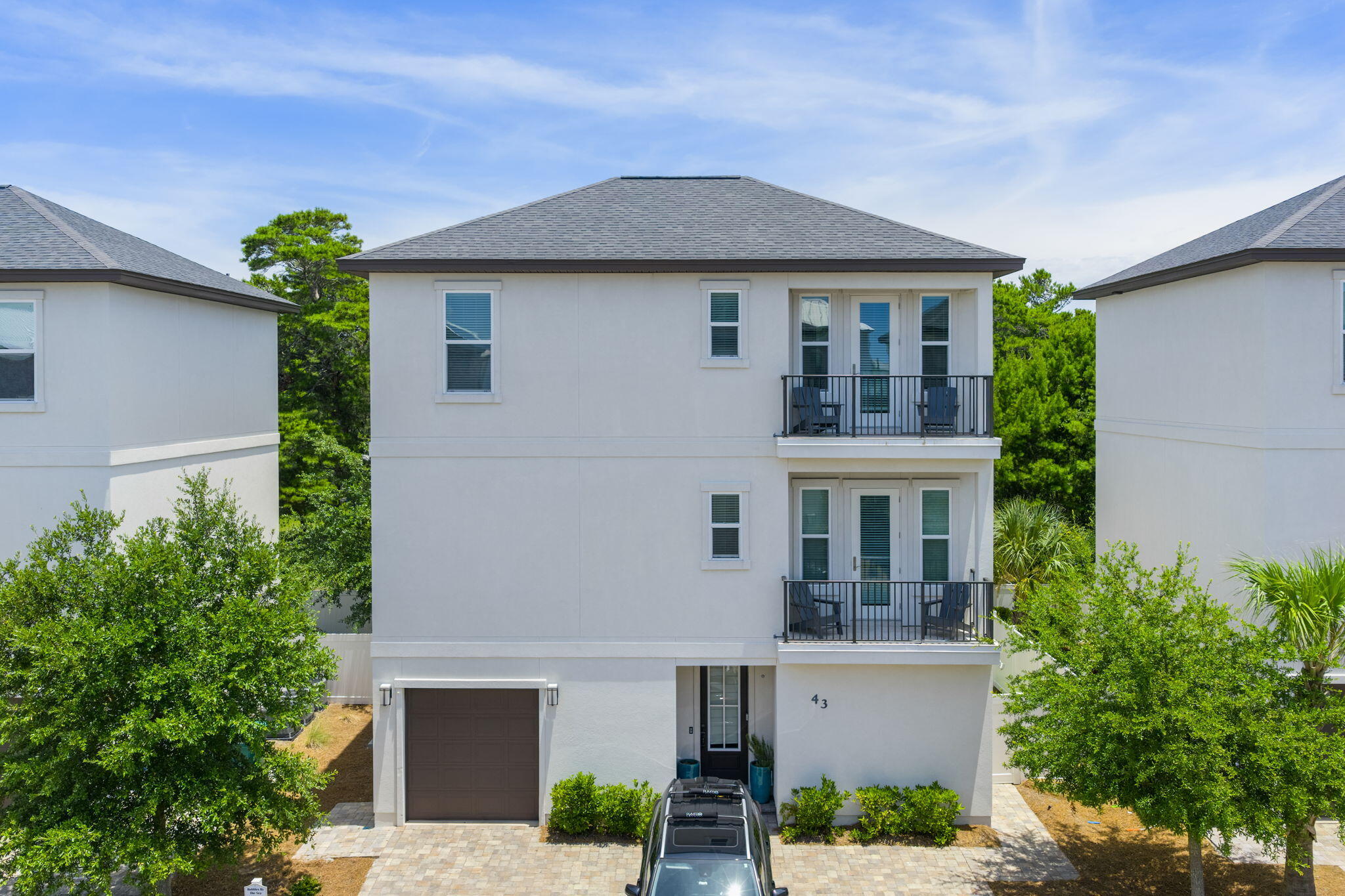 Welcome to 43 Ciboney, a beautifully designed coastal retreat just moments from the shoreline. This spacious 4 bedroom, 3 story residence offers an elevated beachside lifestyle with high-end designer finishes throughout. Thoughtfully curated furnishings are included, making this home truly move-in ready for beach lovers and those seeking a laid-back, coastal escape.
Inside, you'll find stylish quartz countertops, durable wood-look tile flooring, and the convenience of two laundry areas. 
The open-concept layout provides generous living space, and the private backyard offers a relaxing outdoor retreat. A 6-passenger golf cart is also included, perfect for easy trips to the beach.
Perfectly positioned in the heart of the Destin-Miramar Beach corridor, this home offers quick access ==>