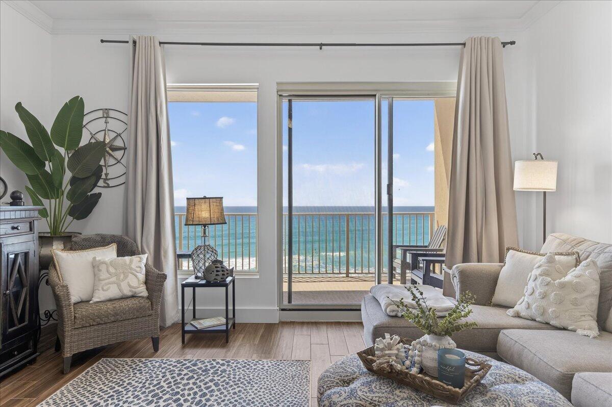 Welcome to this beautifully renovated 2bd/2ba gulf facing condo. High 10' ceilings throughout, offering an open, spacious feel. Features include porcelain tile flooring, quartz countertops in the kitchen and baths, new cabinets, all-new kitchen appliances, updated interior doors and trim, new toilets, and modern light fixtures. The primary bath showcases an opened shower with sleek glass enclosure. Located on the 3rd floor--the same level as parking--simply park and walk across the sky bridge with no elevator needed. Pet-friendly complex offers a heated pool, kiddie pool, gazebos, covered parking, fitness center, owner's lounge, and game room. 2 assigned parking spaces convey with the condo and the crossovers on the first 5 levels of the parking garage make loading and unloading a breeze.