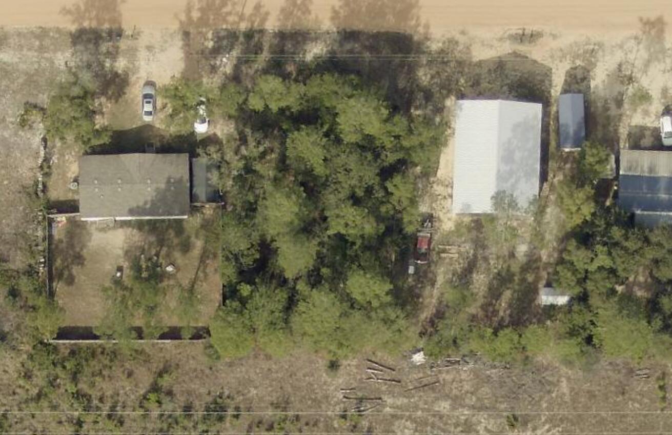 Embrace Your Escape! This beautiful .23-acre wooded lot, nestled between DeFuniak Springs, FL, and Mossyhead, with a newly paved road, invites you to create your own sanctuary. With mobile homes allowed, no HOA, and minimal restrictions, the possibilities are endless. While utilities are not yet established, nearby power offers a promising start to your vision of home. Situated in Flood Zone X, and showing no wetlands per Walton GIS mapping, this land is a canvas waiting for your masterpiece. Enjoy effortless access to I-10 and CR 285 south, connecting you to work and leisure, all within 30-45 minutes of the stunning white sandy beaches of Florida's iconic Emerald Gulf Coast and Crab Island. The information in this listing is believed to be accurate but not guaranteed, and all dimensions are approximate per the CR