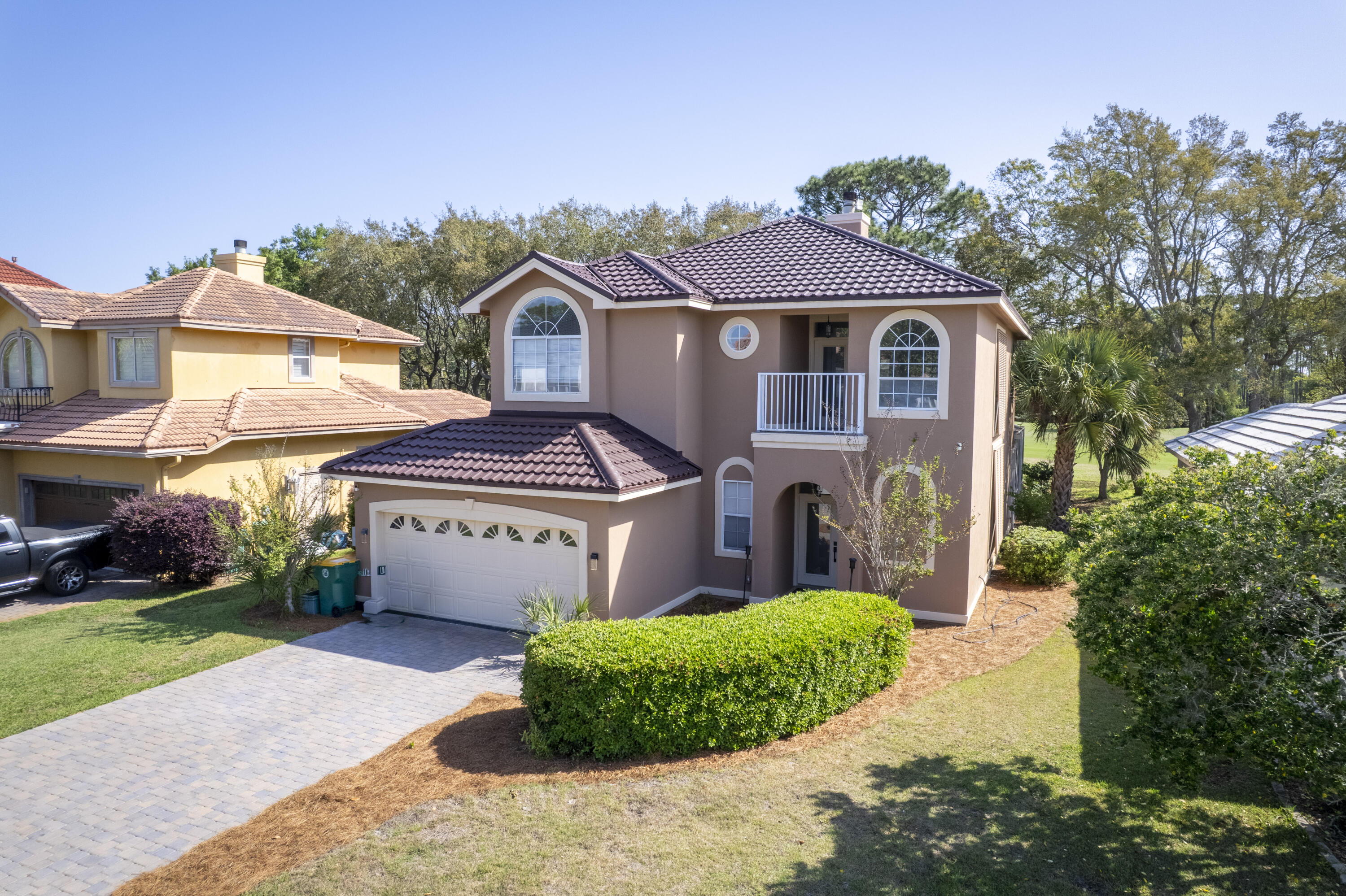 Positioned along the 15th fairway within the highly desired golf course community of Emerald Bay, this beautiful 3BR/3BA residence offers 1,984 sq ft of thoughtfully curated living space. The interior feels warm and inviting, with a layout that simply ''makes sense,'' offering both comfort and functionality.
The outdoor living experience is a true highlight, featuring a private pool and lanai with tranquil golf course views + a hint of bay views --coastal living at its best! 
Living in Emerald Bay means enjoying a quiet, established neighborhood with a strong sense of community, all while being just a short drive from Destin's beaches, sought-after dining, and premier shopping. A peaceful setting that feels tucked away, yet remains incredibly convenient to everything Destin has to offer!
