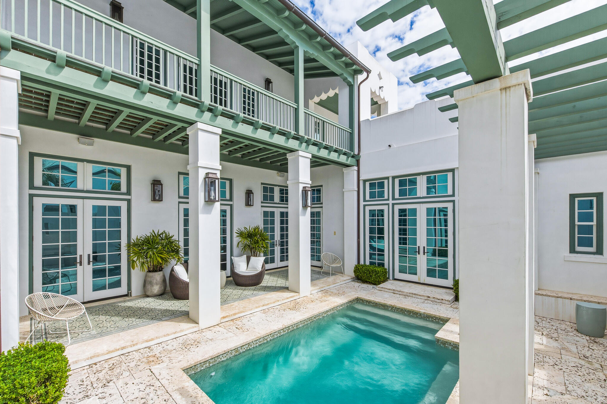 Discover coastal sophistication at 36 Sea Star Court in Alys Beach, where Jason R. Dunham's architectural brilliance captures the essence of luxury living. Ideally situated at the intersection of the Turtle Bale Pedestrian Path and the east-west pedestrian corridor, this stunning corner residence welcomes you with an abundance of natural light, creating an enchanting ambiance from the moment you step inside.

Spanning 3,773 square feet, this home features two elegantly appointed bedrooms on the main level, including one of the two lavish primary suites. The second primary suite, located on the upper level, opens to a breathtaking rooftop terrace--an ideal setting for starlit entertaining.

Designed around a stylish outdoor courtyard, the property boasts a generous swimming pool and a  covered loggia, perfect for relaxation and family gatherings. The great room captivates with soaring double-height ceilings and an inviting gas fireplace, exuding warmth and elegance. The gourmet kitchen is a chef's dream, equipped with a 48-inch Wolf range, a spacious pantry, and seamless access to a large dining room that overlooks a serene courtyard adorned with a tranquil garden, soothing fountain, and outdoor summer kitchen.

Thoughtfully crafted with Dominican Shellstone flooring on the first level and stunning stained oak on the second, each bedroom features en suite bathrooms with exquisite tile work and stone countertops, complemented by spacious closets. This home is not just a residence; it's an entertainer's paradise gifting the outdoor courtyard and swimming pool to your guests.

Homeownership includes access to the exclusive private owners' Beach Club. Don't miss the chance to own this extraordinary property--schedule your private tour today!