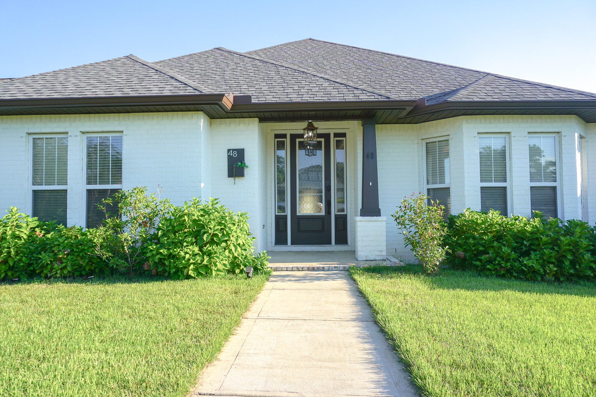 Avail. July 7th! Introducing ''Temple Park at Port Dixie'', 9th. Ave offers wide streets, off street parking for guests, and rear entry garages. This 4BR/3BA, 2-car garage custom brick home has 10 Ft. ceilings & crown molding, LVP flooring throughout home, tile in the bathrooms. Kitchen boasts custom painted cabinetry, granite countertops, large pantry, and stainless appliances (with oversized commercial grade fridge). Additional features include double master bath vanities & walk-in closets, separate walk-in shower & soak-in tub, flex area w/ bay windows, screened in back porch, fenced-in backyard, front AND back parking. Extra storage in the laundry room w/ large cabinets! No inside smoking/vaping allowed. Pets allowed with non-refundable $400 pet fee. W/D hookups avail. AS IS irrigation