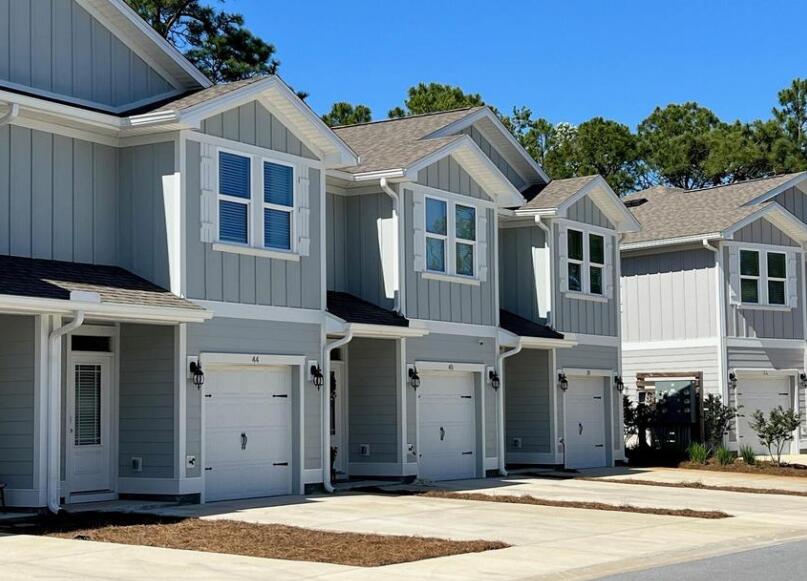 ALL UTILITIES INCLUDED! Located off Mack Bayou Road in Santa Rosa Beach, and just minutes to the shops & dining at Grand Blvd and the beaches of Scenic Hwy 30A. This spacious, unfurnished townhome features 3 bed, 2.5 bath with a garage! Elegant 9' ceilings, granite countertops, ivory colored shaker style cabinetry with brushed nickel hardware, and EVP flooring throughout the entire home (stairs and bedrooms carpeted).  Balcony overlooks wooded area and neighborhood is quiet and secluded. A must see!