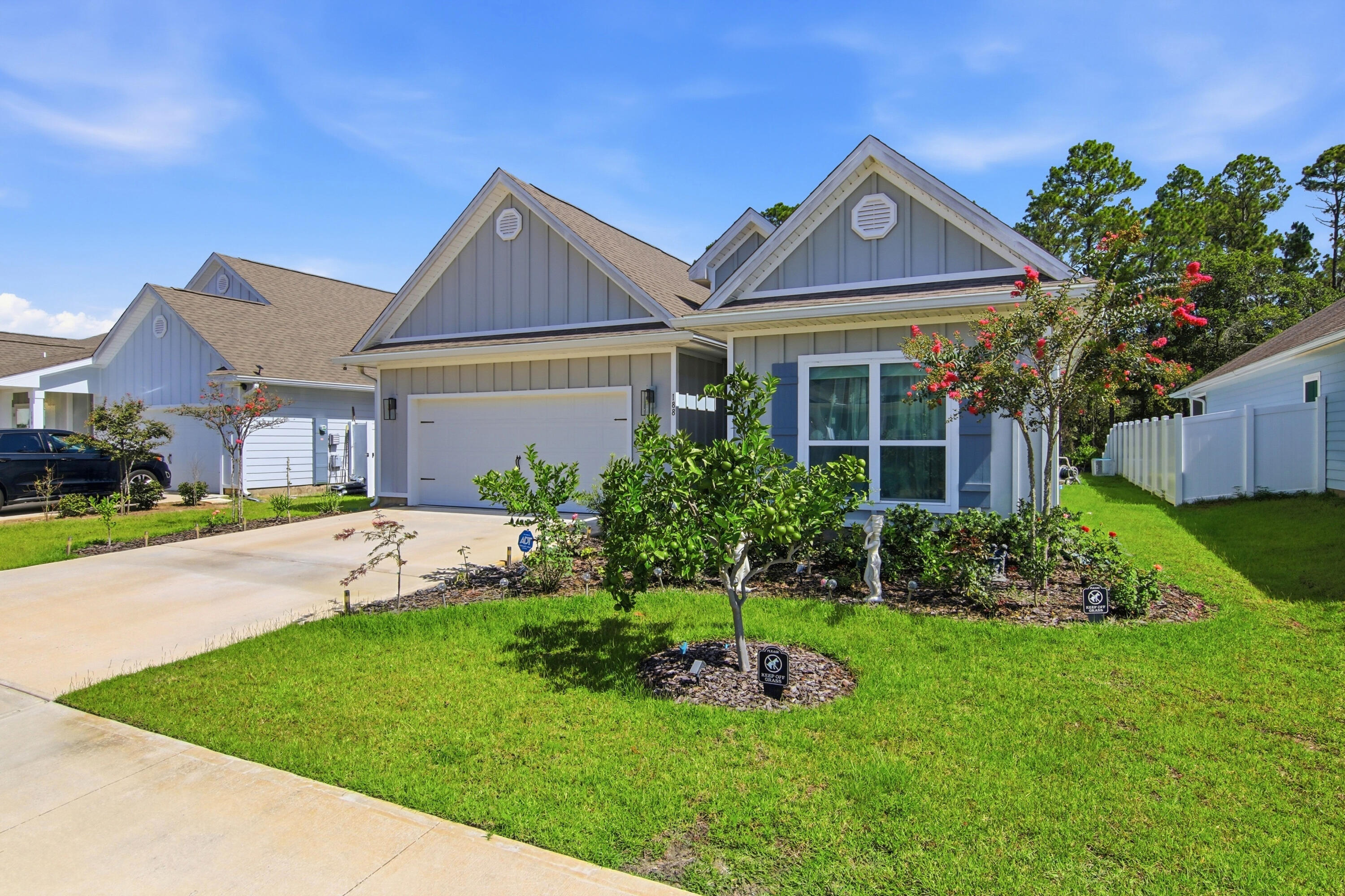 Photos coming soon! Located less than 4 miles from the public beach accesses along Scenic 30A, this beautifully maintained 4-bedroom, 3-bath Kennedy floor plan also includes a dedicated office and offers the convenience of single-story living. Situated in the short-term rental-friendly Walton's Landing community, enjoy a community pool, scenic walking paths, tranquil ponds, and a central location. Inside, the open-concept design features vinyl plank flooring throughout, a spacious living area, and a well-appointed kitchen with quartz countertops, ivory shaker cabinetry, and ample workspace. The generous primary suite includes a large walk-in closet and a spa-inspired ensuite bath with a tiled shower and soaking tub. Thoughtful upgrades include a security system with a doorbell camera and  three exterior cameras, upgraded ceiling fan fixtures in three bedrooms. Outside, the backyard is a true Florida retreat with more than 25 mature citrus trees--including kumquat, lemon, red navel orange, grapefruit, and mandarins--all currently producing fruit. Beautiful rose bushes enhance the front yard, while the screened-in covered porch with epoxy flooring provides the perfect place to relax and enjoy. The garage also features epoxy flooring, a whole-house water filtration system, along with a separate filtration system for the irrigation, allows you to enjoy fresh citrus right from your own trees. This home offers the perfect combination of coastal convenience and  outdoor enjoyment.