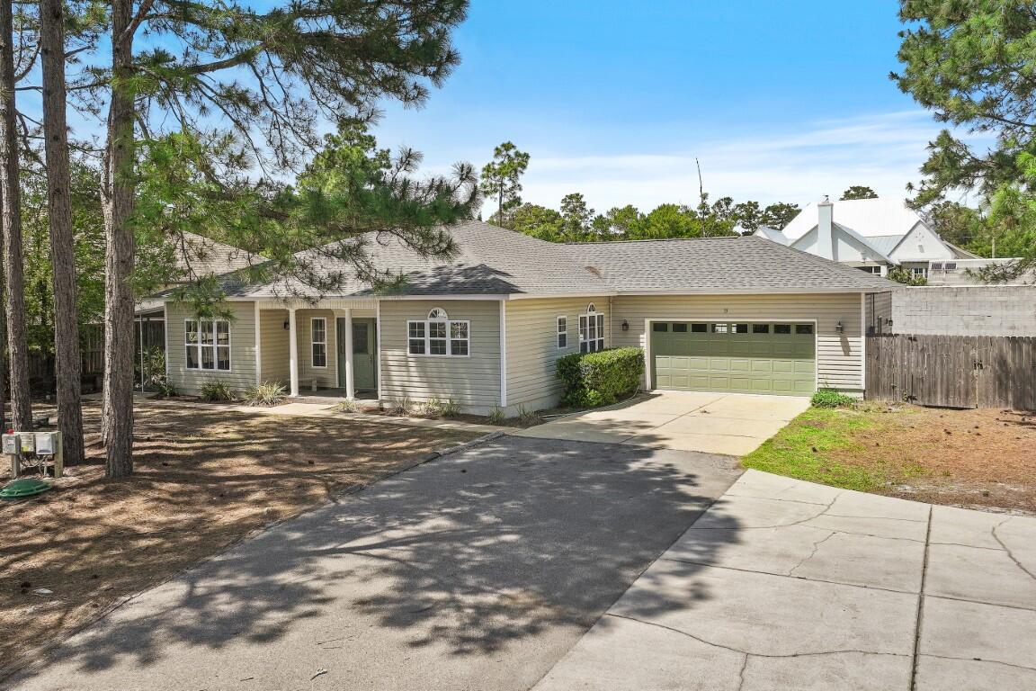 Classic Ranch in Blue Mt Beach on over 1/2 acre site near County Beach/Access! Conveniently located on low traffic, no through street. Plenty of room for expansion, RV/Boat storage onsite.  Recently refurbished interior 2026 including new HVAC system. New roof 11/2022. Bonus/Flex Room easily utilized as additional, 3rd BR, office, workout space. Seller offering $3,000 allowance for new kitchen appliances. Screened porch/patio. Privacy fenced sizable rear yard great for kids, pets & room for a pool. Pines of Blue Mountain subdivision is buffered on N and E sides by State Forest featuring Nature Trails and is convenient to popular local venues.
