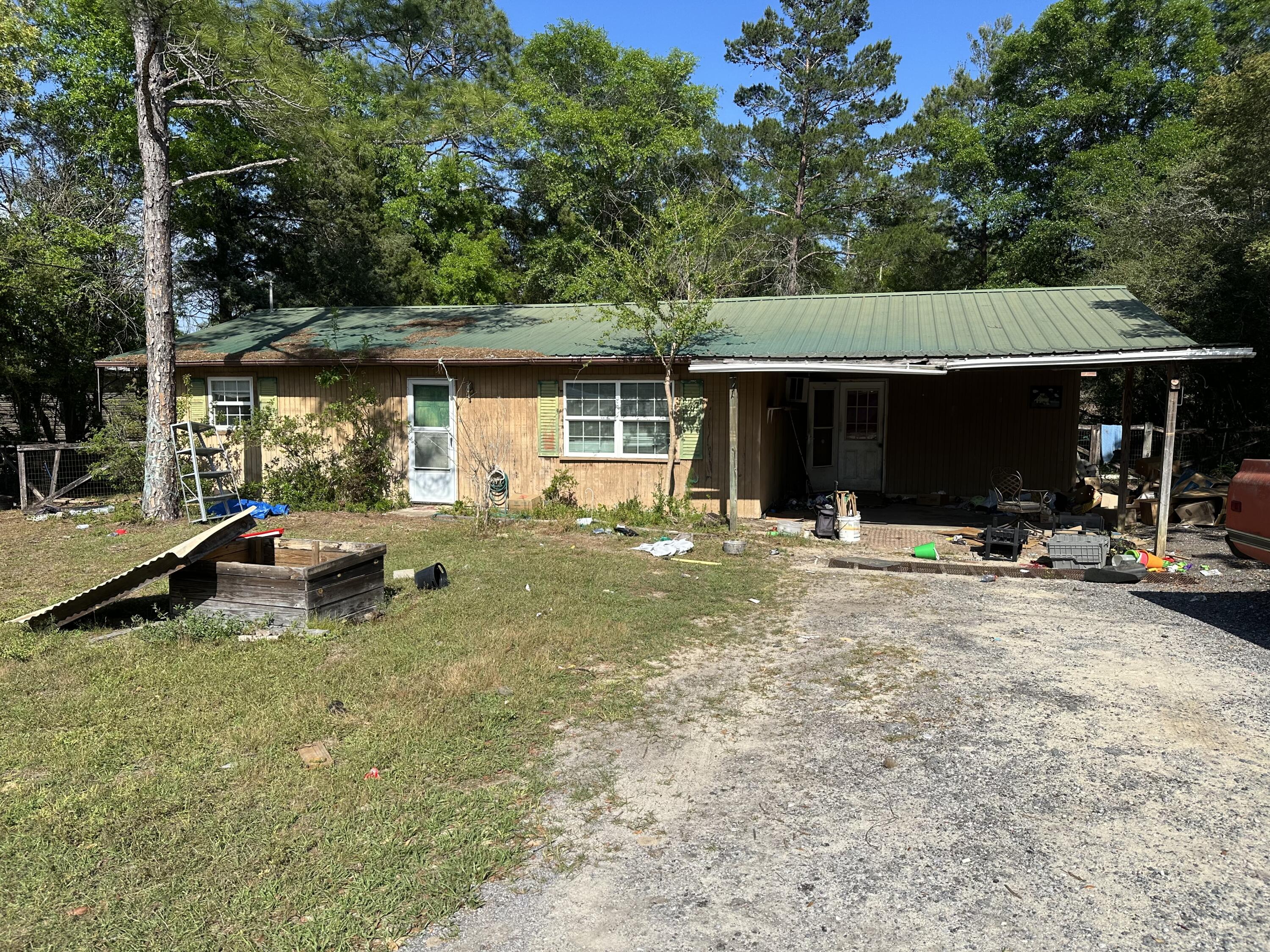 Investor special in a growing area with no HOA! Surrounded by newer construction homes and recently installed mobile homes, this property offers excellent potential for renovation. Situated on a spacious lot with strong upside in an improving area. Ideal opportunity for investors looking to bring new life to the property or add to their rental portfolio. Property will require clean-out and significant repairs. Cash buyers only. Sold as-is.