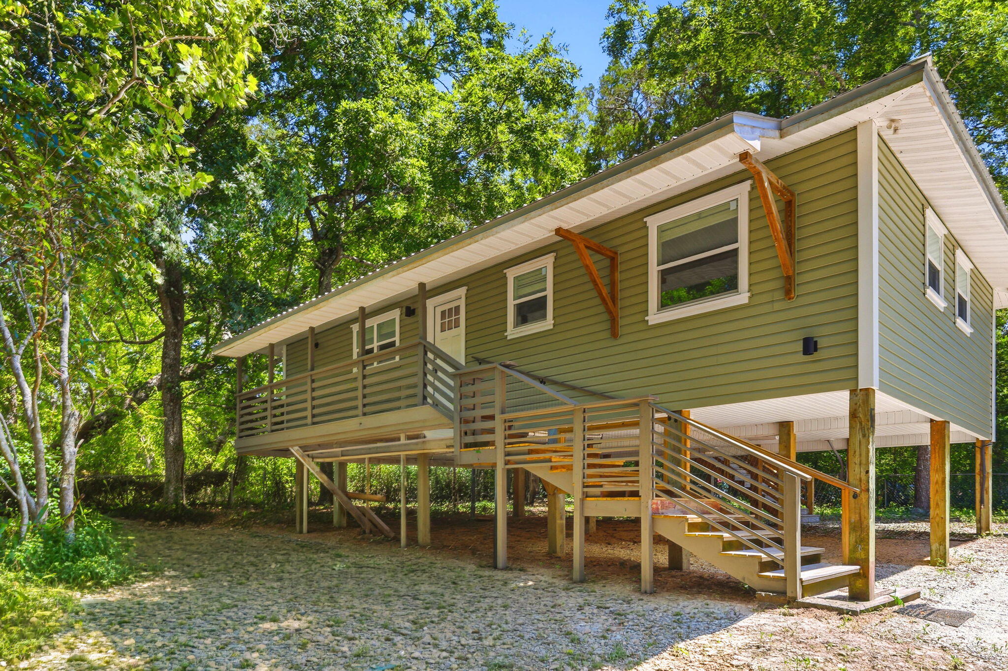 Welcome Home to 35 North Ave, Freeport. This 3-bedroom 2 bath home is located in the heart of Choctaw Beach. Completely renovated in 2023, renovations include new roof, siding, insulation, wiring, plumbing, fixtures, lights, flooring, windows, doors, AC, water heater, shaker cabinets, quarts countertops, completely remodeled bathrooms.
This charming home is nestled among mature trees and has plenty of room for gardening. This home blends country tranquility with the irresistible allure of waterfront proximity. The bay is just moments away and the serene country setting provides a peaceful retreat. It is only a short walk to the Choctaw Beach Park, with a boat launch. It is perfect for picnics, fishing, and stunning Choctawhatchee Bay views. 
The Choctaw Beach neighborhood is a hidden gem in the Florida Panhandle. This area offers exceptional value with convenient proximity to the beaches and attractions of the Emerald Coast.
The adjacent lot next-door may also be purchased if interested.