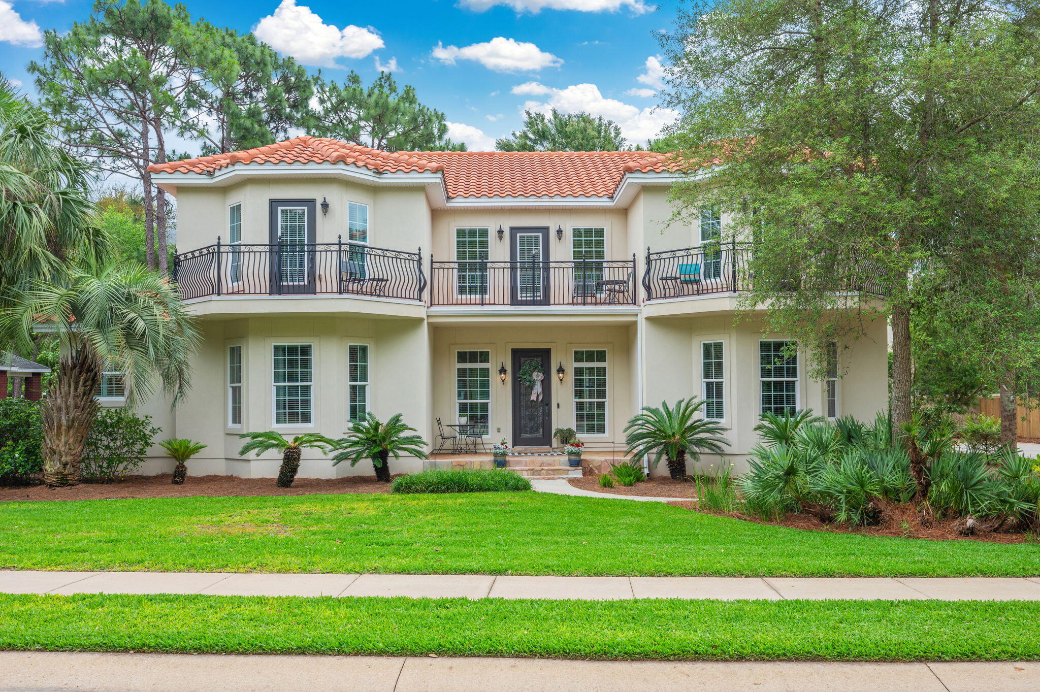 Welcome to Swift Creek, one of the best neighborhoods in Niceville! This custom-built, 4,394-square-foot home sits directly across from the tennis courts and is just a quick walk down the block from the clubhouse, pool, and basketball courts. It features a beautiful Mediterranean style with stucco siding and a classic clay tile roof, but what really sets this place apart is how it was built. The original owners focused heavily on quality where you can't see it. It's constructed with 2x6 exterior walls, heavy-duty 2x10 roof trusses, and solid 5/8'' plywood decking instead of the cheaper OSB you usually find. They also went all-out on energy efficiency and safety, using closed-cell insulation in the attic, open-cell in the walls, and premium Jeld-Wen impact-glass hurricane windows throughout. It's incredibly solid, energy-efficient, and built to last. Inside, the house feels bright, open, and high-end. The kitchen and butler's pantry feature gorgeous granite countertops, high-quality 42'' all-wood cabinets, stainless steel appliances, and a beautiful tile backsplash. You'll notice great architectural details everywhere you look, like the coffered ceiling in the living room and custom tray ceilings in the family room, dining room, master bedroom, and breakfast nook. The main living area is completely wired for surround sound and has a cozy gas fireplace to gather around. The master bathroom is another huge highlight, it's been beautifully updated with a freestanding soaking tub, sleek mirrors, modern gold hardware, and eye-catching tile work. One of the coolest parts of the property is the massive 700-square-foot bonus room (5th Bedroom) above the 3-car garage. Because it's heated and cooled and has its own full bathroom (complete with a shower, vanity, and even a urinal), it makes the perfect man cave, a private home office, or a separate guest suite. Out back, you can look forward to hanging out on the massive 655-square-foot screened lanai, which already has a gas hookup ready for your grill. The backyard is completely private thanks to a 6-foot fence. This property has been extremely well maintained, and the pride of ownership truly shows! Be sure to check out the 360 virtual tour to get a real feel for the layout.