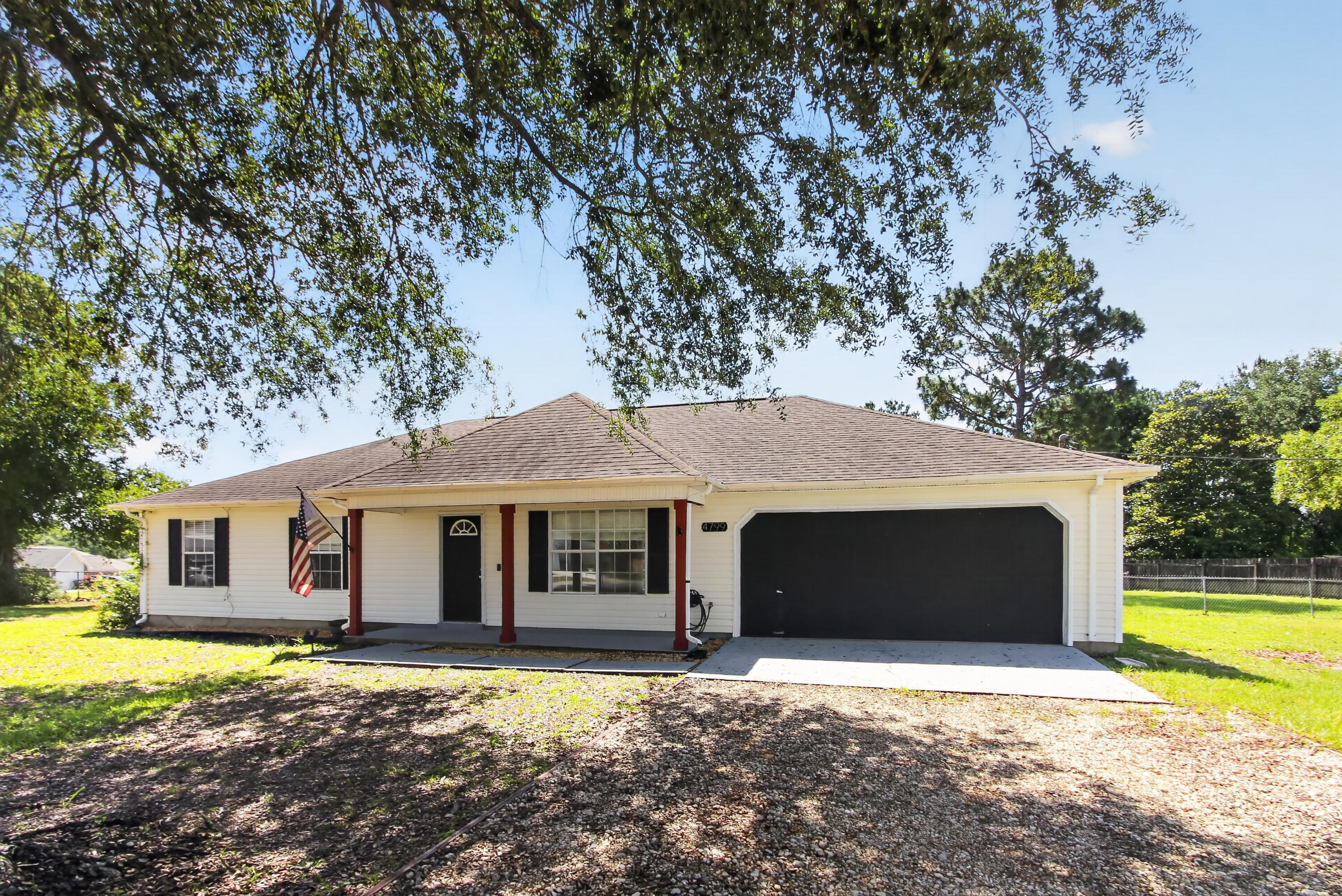 Conveniently located just minutes from Duke Field, Eglin AFB, and the 7th Special Forces Group, this home is ideal for military personnel and commuters alike. Shopping, dining, schools, and everyday conveniences are only 10-15 minutes away, making this South Crestview location one of the area's most sought-after areas.

This charming 3-bedroom, 2-bath home is situated on a spacious corner lot in the established Coronado Village community. Inside, you'll find a bright and inviting floor plan featuring a spacious living room with a soaring cathedral ceiling, creating an open and airy feel throughout the main living area.

The large eat-in kitchen overlooks the fenced backyard and provides plenty of space for everyday living and entertaining. The primary suite offers generous room sizes along with dual walk-in closets, while two additional bedrooms provide flexibility for family, guests, or a home office. An oversized laundry room and two-car garage add extra functionality and storage.

Outside, you'll appreciate the added space, privacy, and curb appeal that come with this corner lot property. If you're looking for a home with a convenient location, functional layout, and easy access to everything Crestview and the Emerald Coast have to offer, this property is a must-see.

 Rental Terms: One-year lease required. Application fee is $45 per applicant age 18 and older. Security deposit required. Property is on a septic system; tenant will be responsible for a $150 annual septic maintenance fee. Pets may be considered upon owner approval. Tenant is responsible for all utilities and lawn maintenance throughout the lease term.