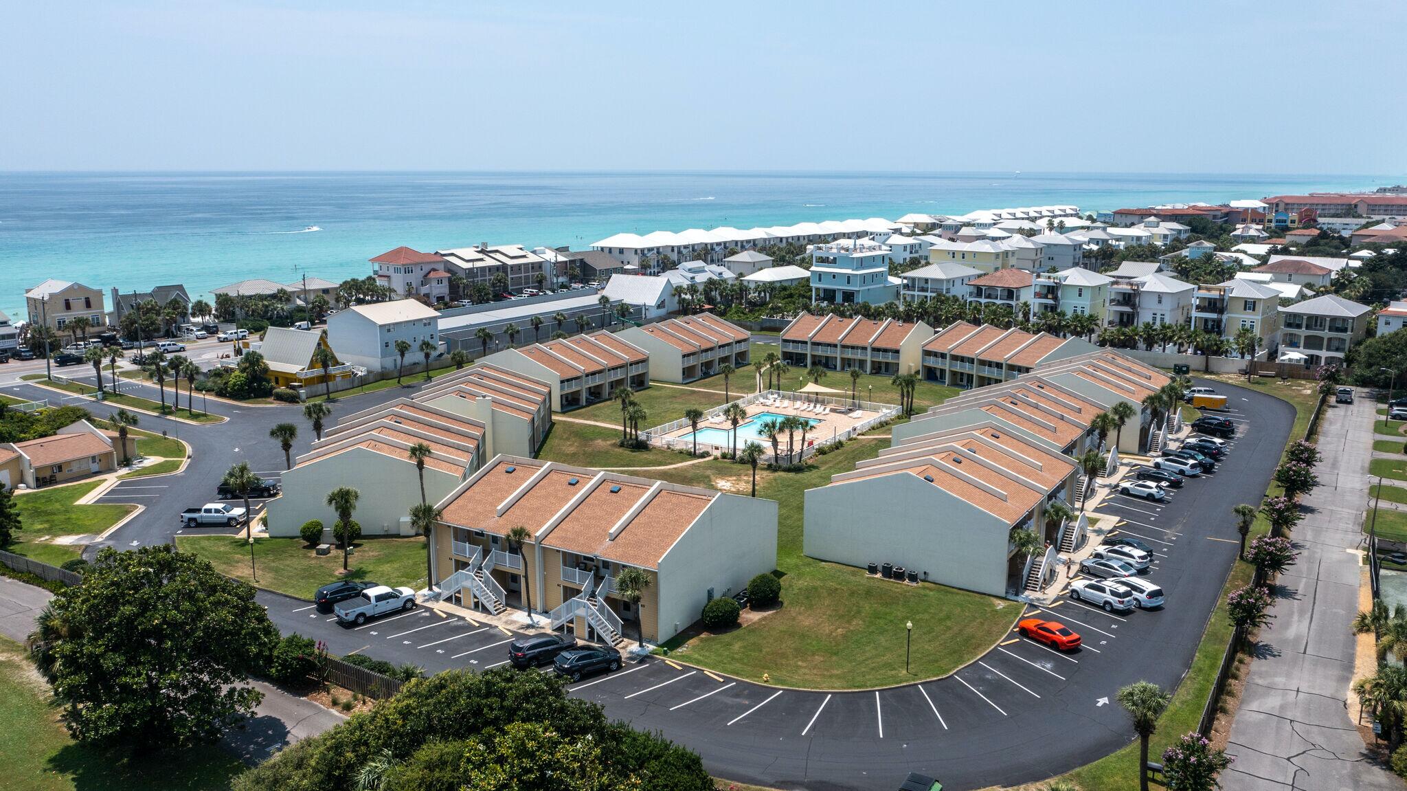 Immerse yourself in modern coastal living with Unit 7A at Seacove | Miramar Beach. Recently remodeled this 1 bedroom/1 bathroom condo is a perfect blend of style and functionality, offering direct deeded beach access for those seeking the ultimate coastal lifestyle.
The private laundry room adds convenience to your daily routine with washer & dryer & plenty of storage space.
This ground-floor unit opens to a private patio, providing a tranquil outdoor space overlooking the expansive courtyard. Your designated parking spot is just outside the front door, & the zero-entry saltwater pool is just steps away, inviting you to relax.
Seacove isn't just a residence- it's a lifestyle.