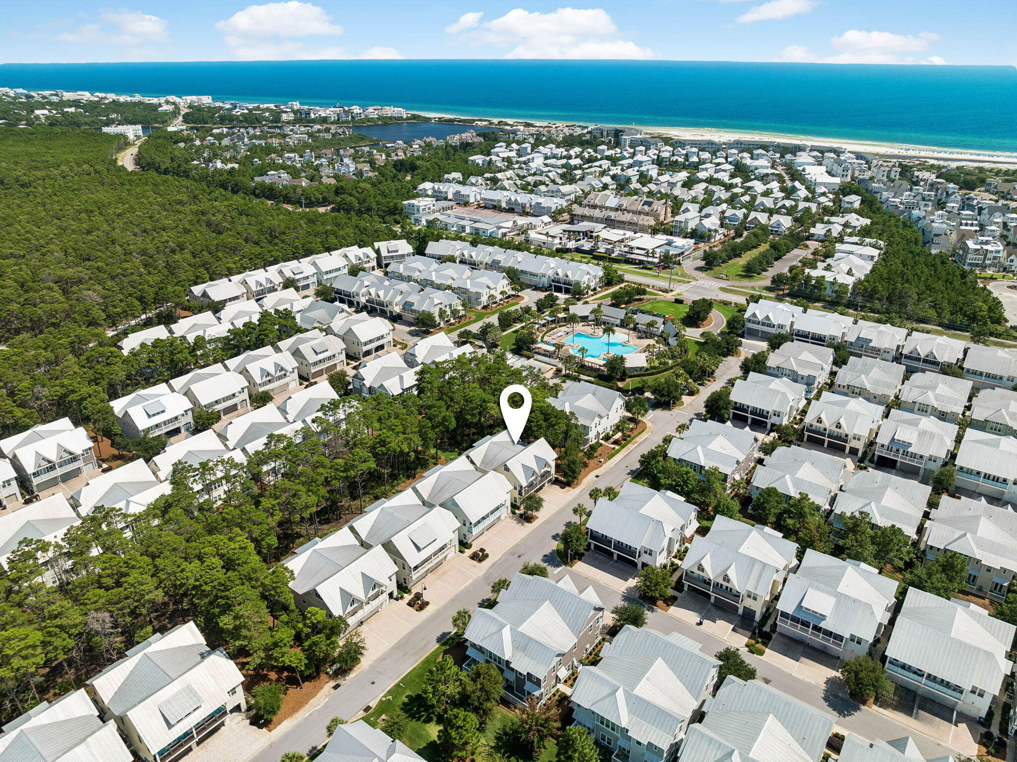 Whether you're searching for the perfect beach retreat, a full-time coastal residence, or a high-performing vacation rental, this beautifully appointed townhome offers the ideal combination of comfort, convenience, and location. Perfectly positioned in one of the most desirable settings within Prominence North, the home is surrounded by peaceful wooded green space, providing exceptional privacy while remaining just one building away from the resort-style pool, fitness center, and community amenities.

Offered fully furnished and move-in ready, this meticulously maintained residence allows you to begin enjoying the 30A lifestyle immediately. The spacious two-car garage offers abundant storage for beach gear, bicycles, paddleboards, and everything needed for everyday living or vacation adventures. A six-passenger golf cart is also included, making it easy to explore the community and nearby attractions.

Ideally situated along Scenic Highway 30A between Seaside and Rosemary Beach, Prominence is one of the area's most sought-after coastal communities. At its heart is The Big Chill, a beloved destination featuring casual dining, boutique shopping, live entertainment, family events, and an inviting atmosphere that has made it a favorite gathering place for both owners and visitors. Whether you're relaxing by the pool, biking the nearby trails, spending the day at the beach, or enjoying an evening under the stars at The Big Chill, this exceptional home offers the very best of the 30A lifestyle.