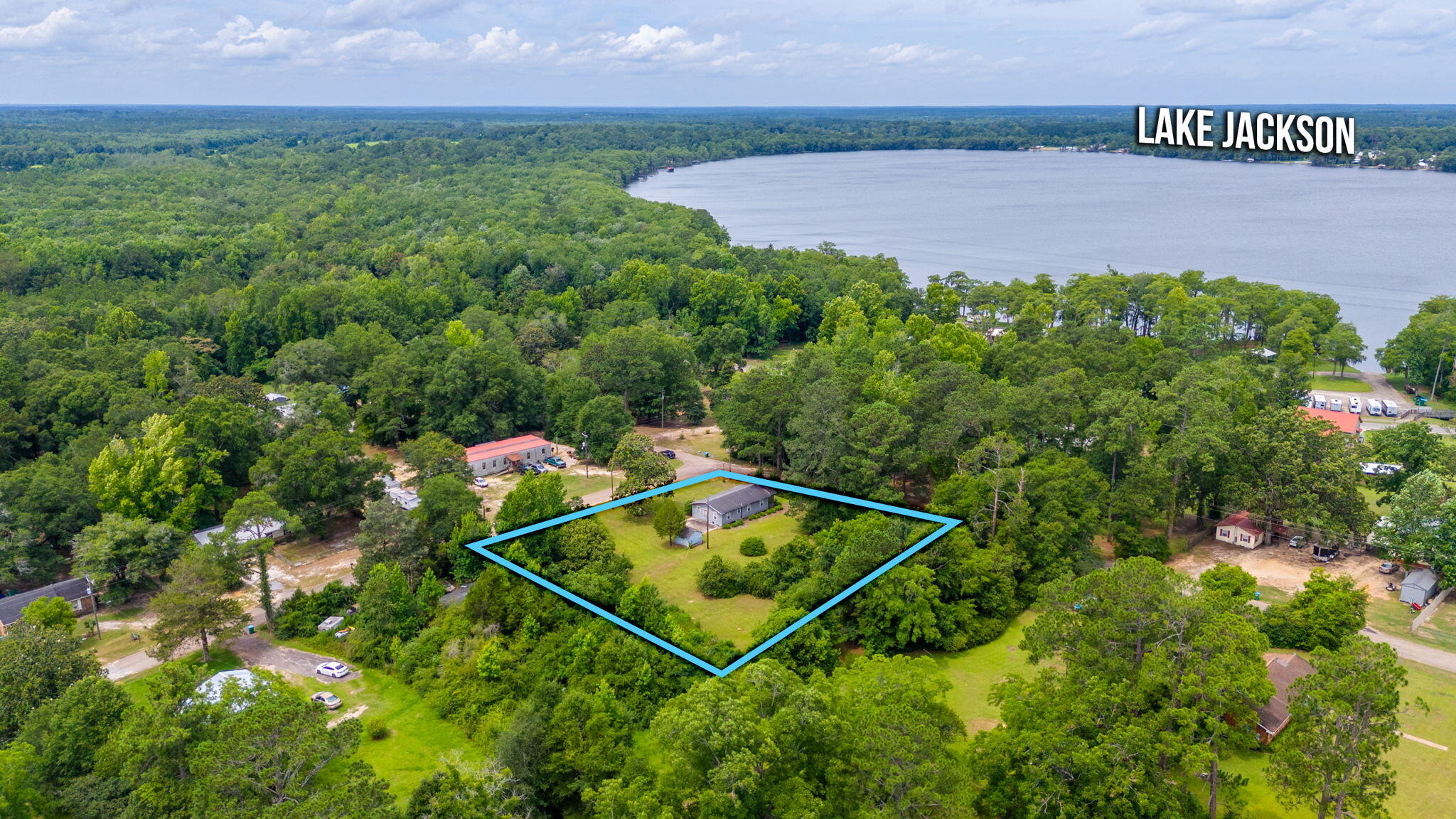 Location is EVERYTHING! 1 block off Beautiful Lake Jackson this property offers 4 buildable lots with city utilities already in place! All lots face Elm Street which offers a quiet entry to property. Property offers great landscaping already in place, mature trees and endless opportunities for what you are looking for! Property of this size does not come available often in this area with this size acreage! Call today to view this great buy located less than 1 hour from the white sandy beaches of South Walton County Florida. Escape the prices of Florida just over the line in BEAUTIFUL and WELCOMING Florala, AL! Low taxes, low insurance gives you the opportunity to build your dream home or development is endless. Florala is golf cart friendly and offers all you need for small town living.