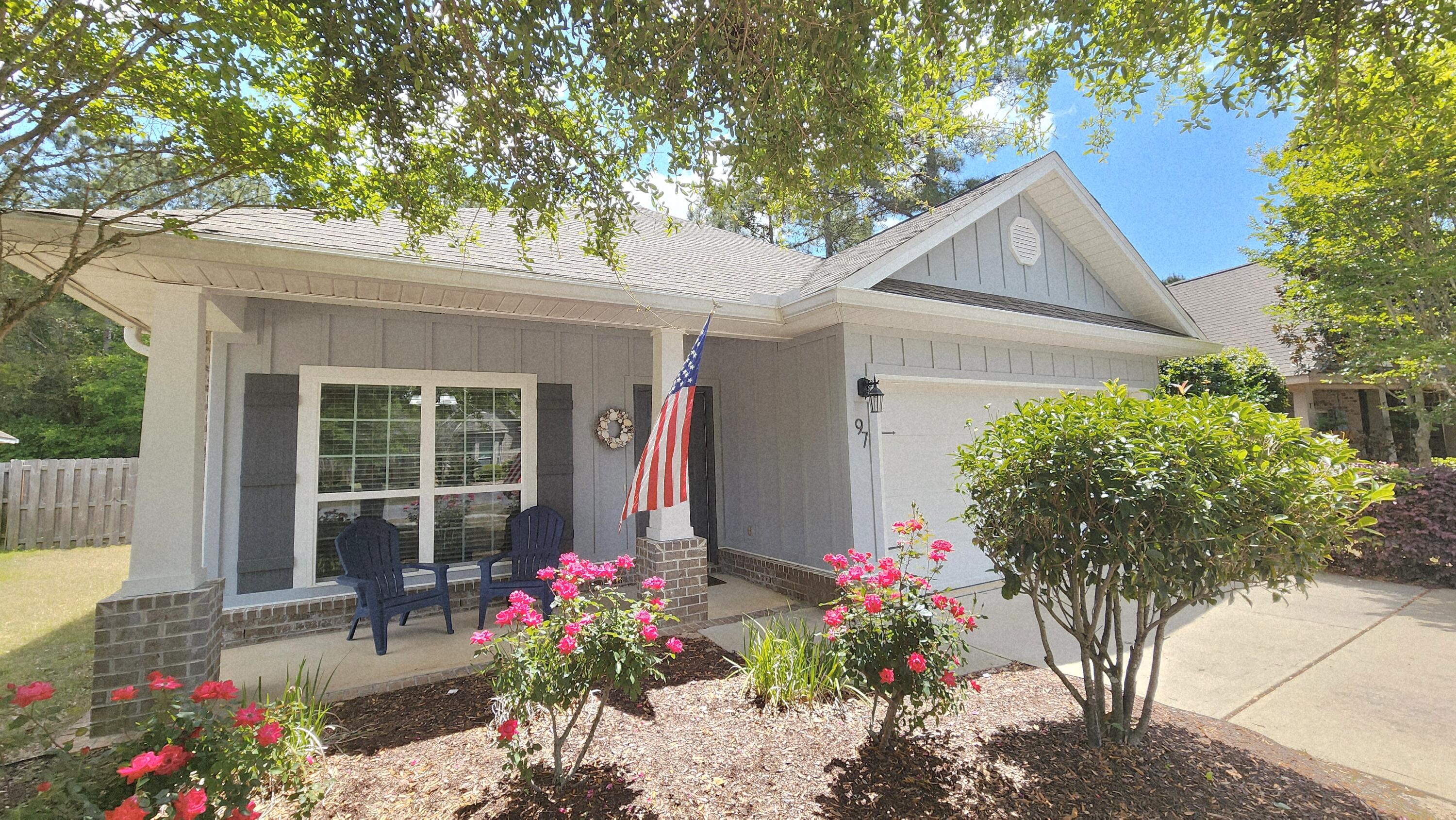 Resort-style living in Hammock Bay at 97 Dickens Drive! 

Located less than a mile from the General Store, brewery, clubhouse, pool, and fitness center, this home offers easy walkable/bikeable access to top amenities. Situated in the desirable Passages at Hammock Bay, this 2015-built 'Oakley' floor plan features 3 bedrooms, 2 baths, and approx. 1,721 sq. ft. 

Enjoy wood-look tile flooring, a cozy gas fireplace, and a flex room ideal for an office or craft space. The open-concept layout is perfect for entertaining, with a spacious kitchen featuring granite countertops, stainless steel appliances, custom backsplash, and center island.

Relax on the screened-in porch overlooking a spacious fenced backyard which is ideal for pets, play, or outdoor living.